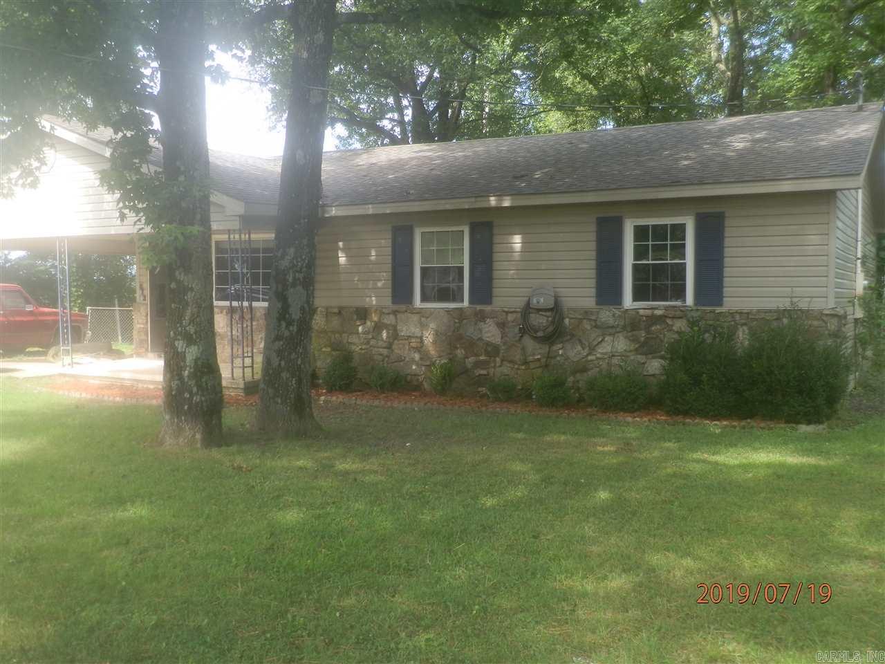 This nice brick home is secluded at the end of the street. Large shade trees provide a nice shelter from the heat when you're outside. Inside is a large eat-in kitchen with breakfast bar, separate laundry room and three bedrooms. Recently painted inside. New carpet installed this year. Apply with the property manager. Application fee charged.