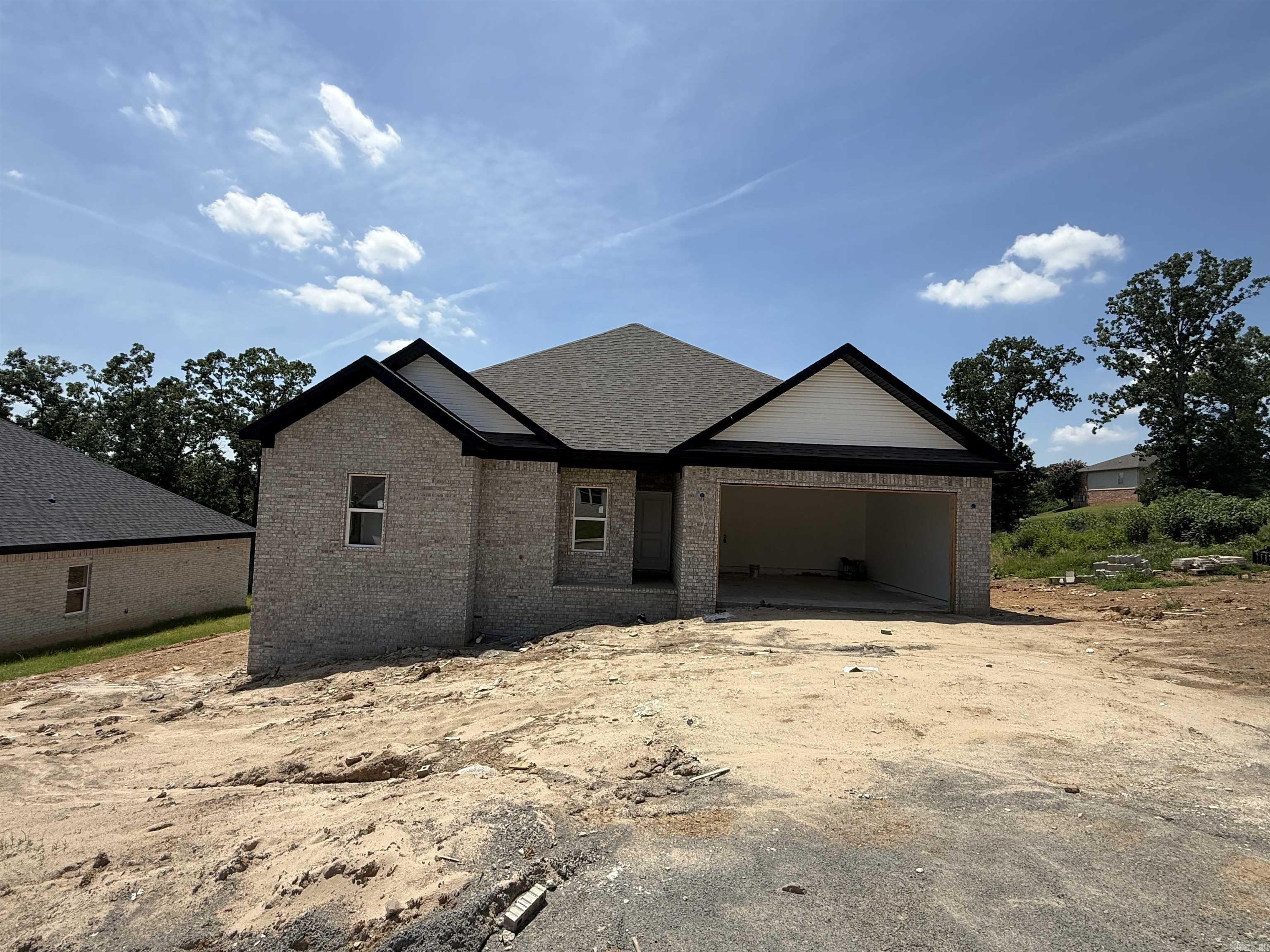 Welcome to this 2026 New Construction home that will be ready for you soon! The home is a 4-Bed, 2 Bath w/Split Floorplan w/an Open Concept. The master bed, bath and closet is amazing! The home is an ideal location only 2-3 min from I57/67/167 and the new Pre K complex for Cabot Schools. Once the new road connects this property will also be a short trip to Gametime at the Grounds too! Presently, the property is a short 8-10 min drive to Greystones Golf Course as well! Completion in approx 60-days.  Stay tuned for updates to this Listing!