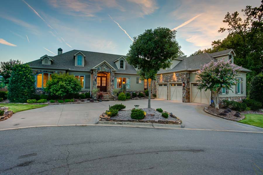 Stunning, custom home by Carl Grey Henson, Southern Living builder, on the AR river w/ 180* view!  On .72 acres at the back of a culdesac this luxurious home offers unparalleled privacy & totally private view of the AR river & Pinnacle Mtn. Two artfully designed levels! Main level w/ master ste, 2 guest beds, office, & all common space.  Lower level ideal for teens/inlaws/nanny.  Incredible media room! 4 car garage! Private deep water Boat dock, inground heated salt spa, Firepit terrace.  One of a kind home