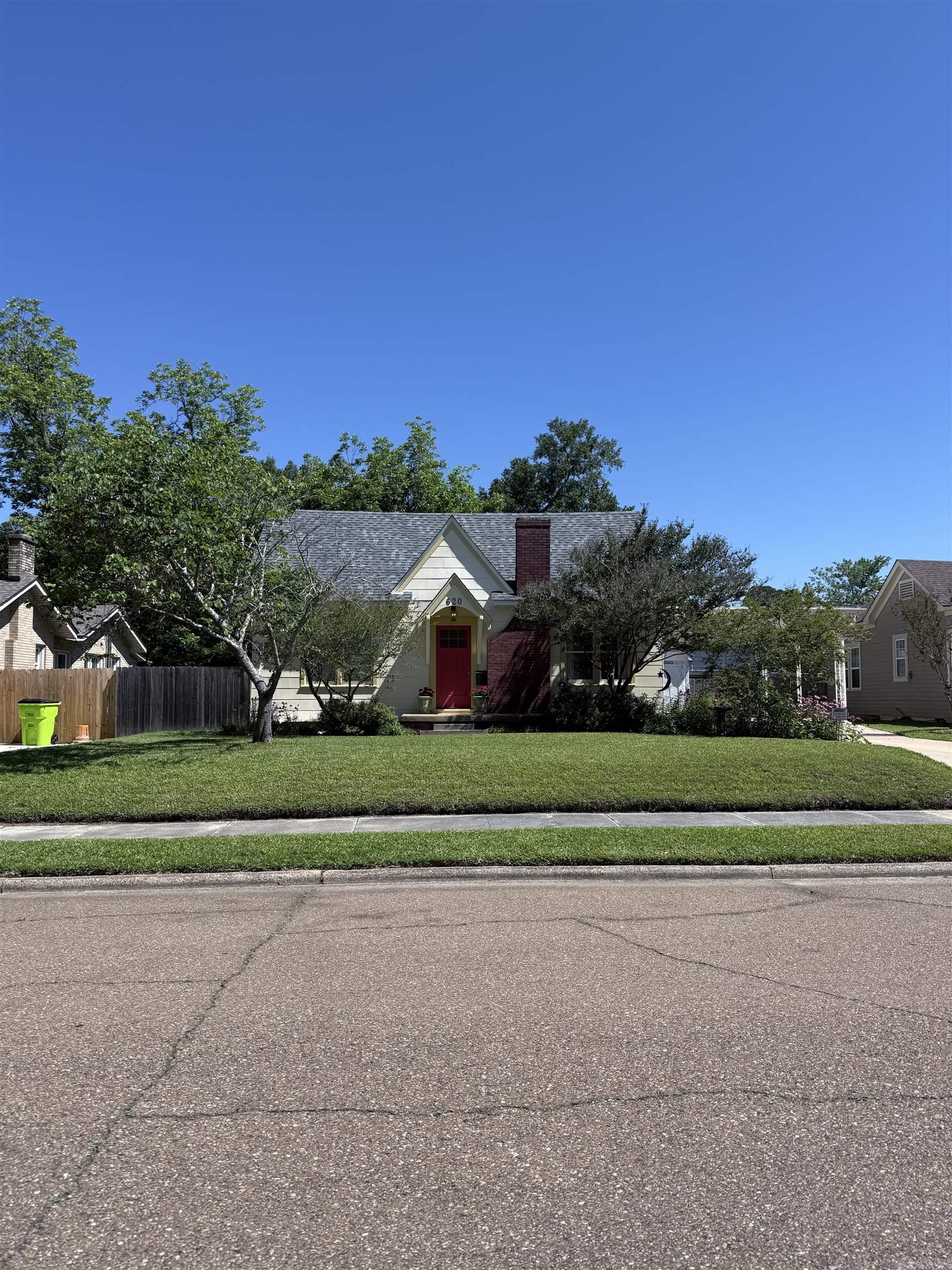 Adorable and neat as a pin cottage home in the Northeast side of town. Fenced back yard, double carport, new roof in February 2025, tankless water heater. 2 bedroom and 1 bathroom. Additional storage outside. Security system. Manicured lawn. This one is a beaut!