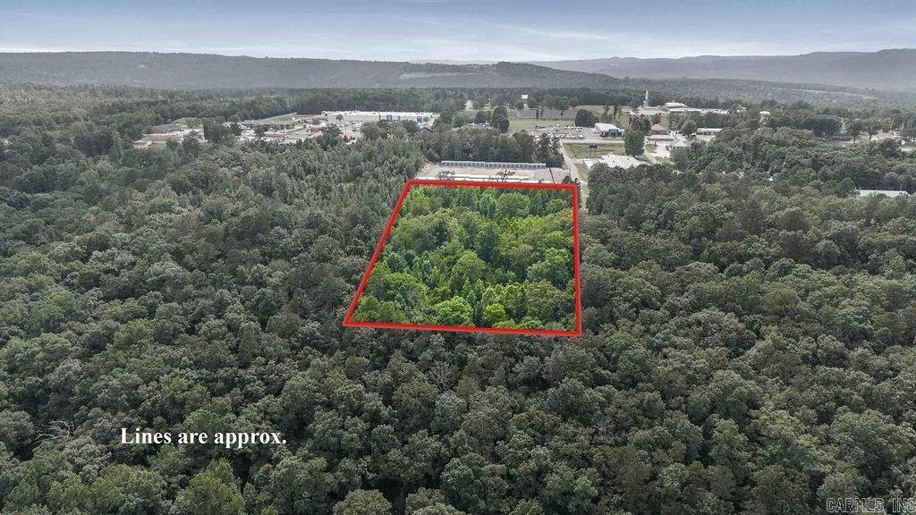 Opportunity awaits with this versatile 4-acre tract offering outstanding potential for commercial development. Conveniently located with excellent access, this property is ideal for a variety of business opportunities including retail, office space, storage units, service businesses, or investment development (subject to zoning and approvals). The mostly level acreage provides ample room for buildings, parking, and future expansion. Whether you’re looking to establish a new business or invest in a growing area, this property offers the space, visibility, and flexibility to bring your vision to life.