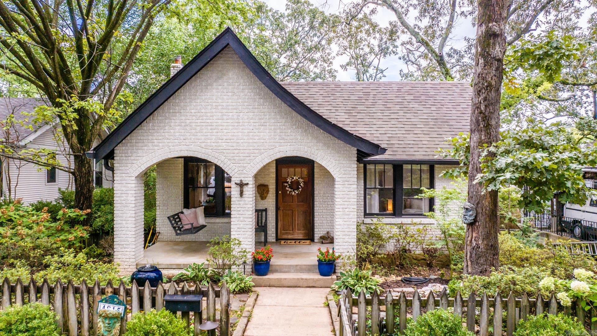 This is a charming 2 bed/2 bath in the heart of Hillcrest.   Out front you’re greeted with your large front porch with the cozy porch swing and great custom landscaping. You’re welcomed inside into your spacious living with large windows, giving a ton of natural light.   Continue into your dining with built in shelving that opens nicely into your kitchen with the large pantry and fridge that can stay.  Privately set apart down the hall is your oversized primary suite with the walk in closet and attached full bath.   Down the hallway to the right you’ll find your guest bed and guest bath.   Take the stairs to find your walk out basement, great for storage or a workout room as well as a heated and cooled office space / man cave!   Out back you’ll find your deck, fire pit, and large shade trees to enjoy some nice privacy outdoors.   We can’t wait for you to come and see if it’s yours.
