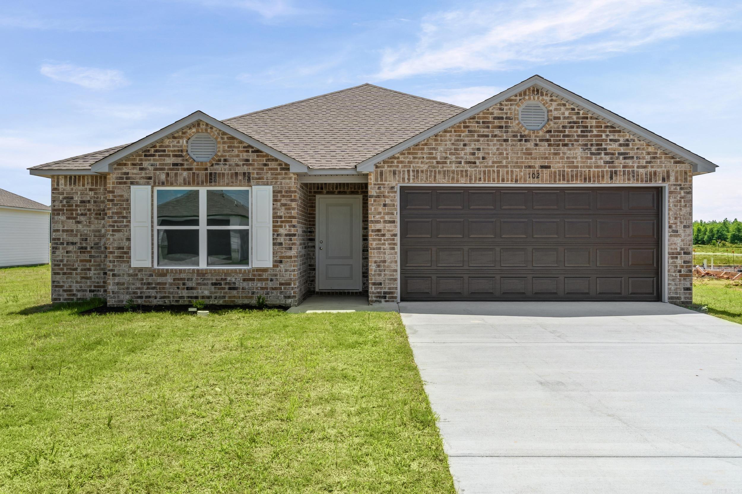 The charming  Magnolia plan is full of curb appeal with its welcoming front porch and front yard landscaping. This home features an open floor plan with 4 bedrooms, 2 bathrooms, and a large family room. Also enjoy a cozy breakfast/dining area, and a lovely kitchen fully equipped with energy-efficient appliances, ample counter space, and a roomy pantry for snacking and delicious family meals. Plus, a covered entryway. Learn more about this home today!  **SEE SHOWING REMARKS & AGENT REMARKS FOR IMPORTANT INFORMATION**