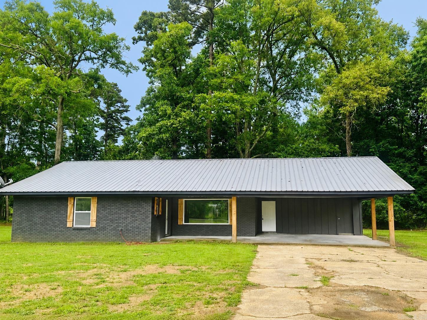 Beautifully remodeled 3-bedroom, 2-bath home on approximately 1 acre just outside the Crossett city limits. Updates include luxury vinyl plank flooring, fresh neutral paint, painted brick exterior, all new lighting, updated kitchen cabinets, new stove, refrigerator, and remodeled bathrooms. Washer and dryer will remain. Move-in ready with modern finishes throughout and plenty of outdoor space to enjoy. Country feel with the convenience of town nearby!