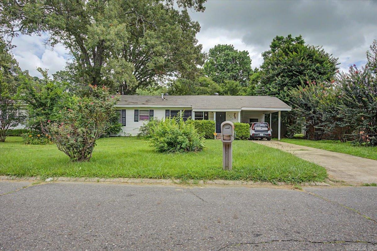 **Charming 3-Bedroom Home with Modern Updates | Texarkana, AR**Discover this charming 3-bedroom, 1-bath home featuring 1,080 square feet of comfortable living space on a generous 9,365-square-foot lot. Built in 1976, the property offers hardwood flooring, vinyl siding, a crawl space foundation, city water and sewer, and a convenient carport. Recent upgrades include a newer shingle roof and water heater, adding lasting value and peace of mind. Situated in an established neighborhood with no HOA, this home combines comfort, functionality, and outdoor space with room to make it your own. Ideal for homeowners and investors alike, this Texarkana property offers an excellent opportunity in a convenient location.