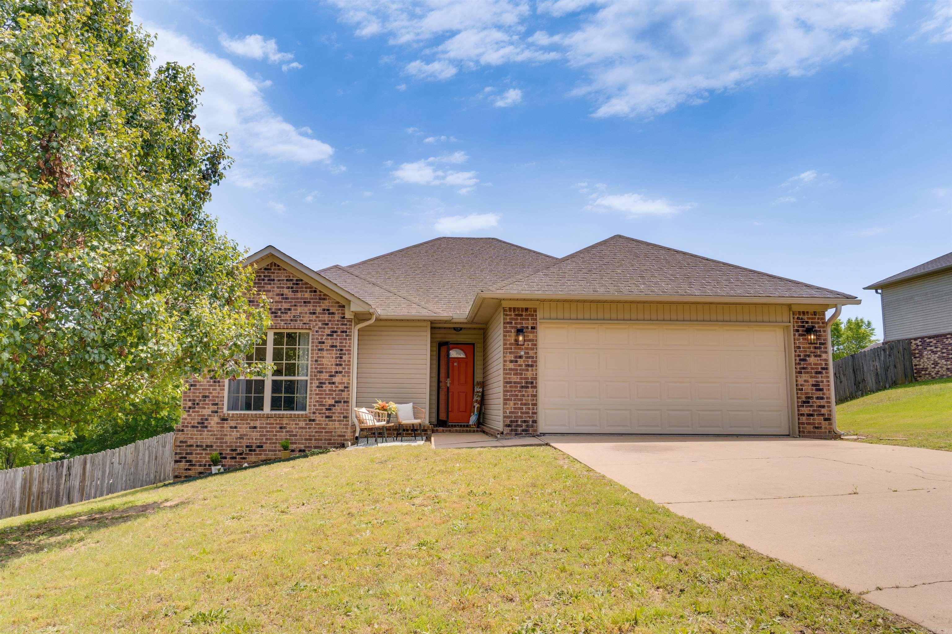 Welcome to 321 Weathering Lane in Austin, Arkansas—a beautiful 3-bedroom, 2-bath home that offers the perfect blend of comfort, functionality, and outdoor living. Step inside to find a spacious and inviting layout designed for both everyday living and entertaining. The two-car garage provides ample storage and convenience, while the covered back patio creates the perfect setting for relaxing evenings or weekend gatherings. Enjoy privacy and peace of mind in the fully fenced backyard—ideal for pets, play, or simply unwinding. Don’t miss your opportunity to make it yours!  This home includes ALL appliances. Washer, dryer, fridge, dishwasher, built in microwave, electric fireplace and outdoor tv. All other furniture is negotiable! To show call or text agent 501-231-7718.