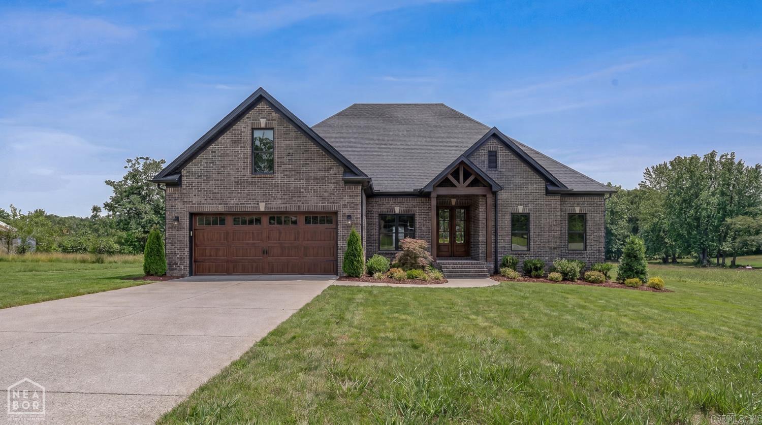 Brand-new construction on 5 acres in the Brookland School District! This beautiful home offers modern finishes, thoughtful design, and the space buyers are looking for both inside and out. The open, inviting layout is ideal for everyday living, while the fresh new construction provides the ease and confidence of a move-in-ready home. Situated on 3 acres, the property offers endless possibilities outdoor living, gardening, a future shop, hobby space, or simply enjoying the extra room and privacy. The built-in safe room adds an important layer of security and peace of mind, making this home as practical as it is beautiful. With new construction, acreage, Brookland schools, and a convenient location near Jonesboro and Brookland amenities, this property checks all the boxes. A rare opportunity to own a new home with land schedule your showing today! *some pics have been digitally enhanced to show what completetion will look like.