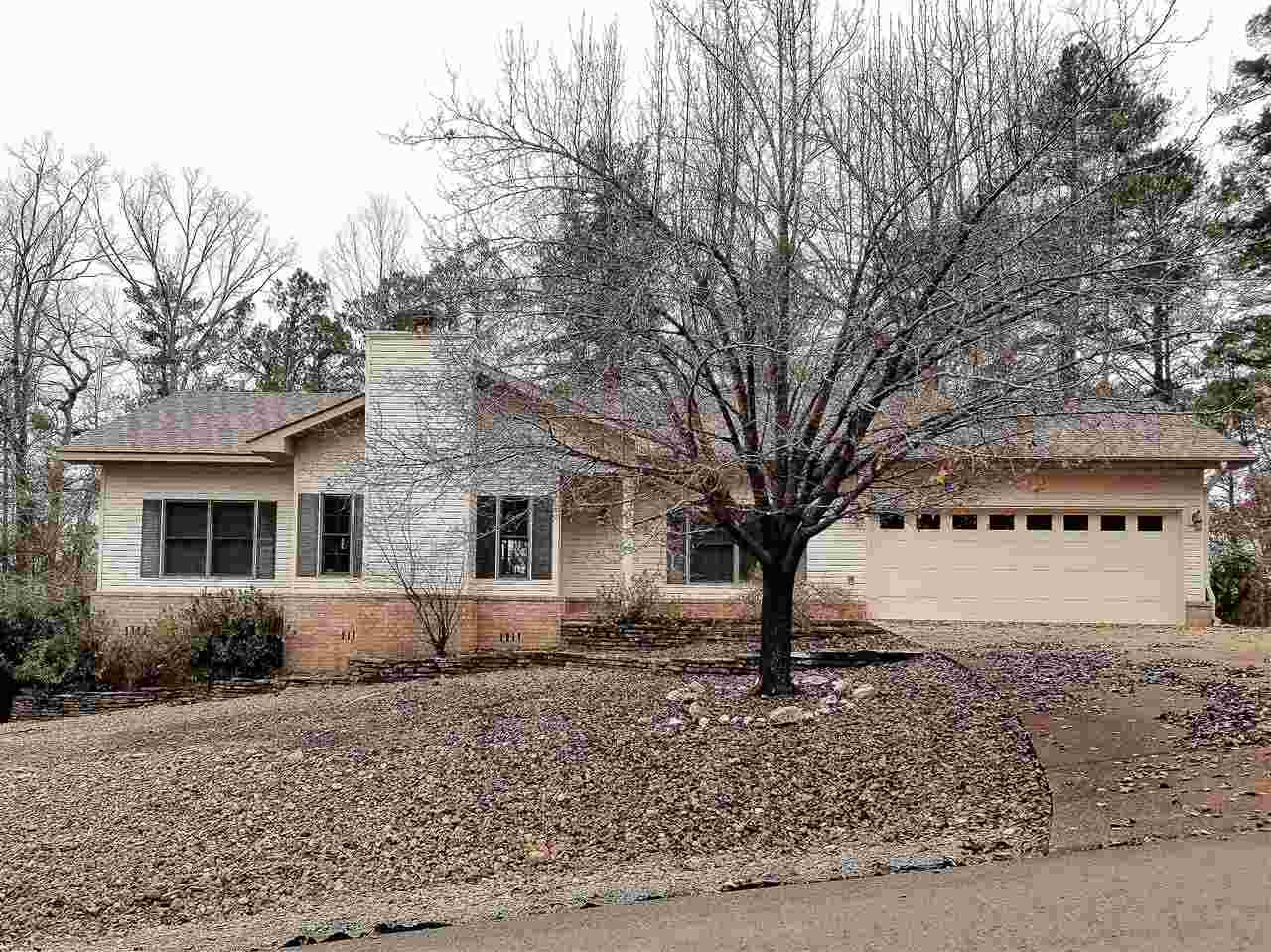 Built in 2000, this 1,550 square feet home has 2 bedrooms plus another room with no closet that could be used as a 3rd bedroom, office, den, etc. Split floor plan.  Great room with living/dining plus breakfast area in kitchen.  2-car garage with storage area.  Great location in the east end of Hot Springs Village; enjoy the peaceful privacy from your back deck!  New roof in 2016. One-Year HMS Home Warranty .