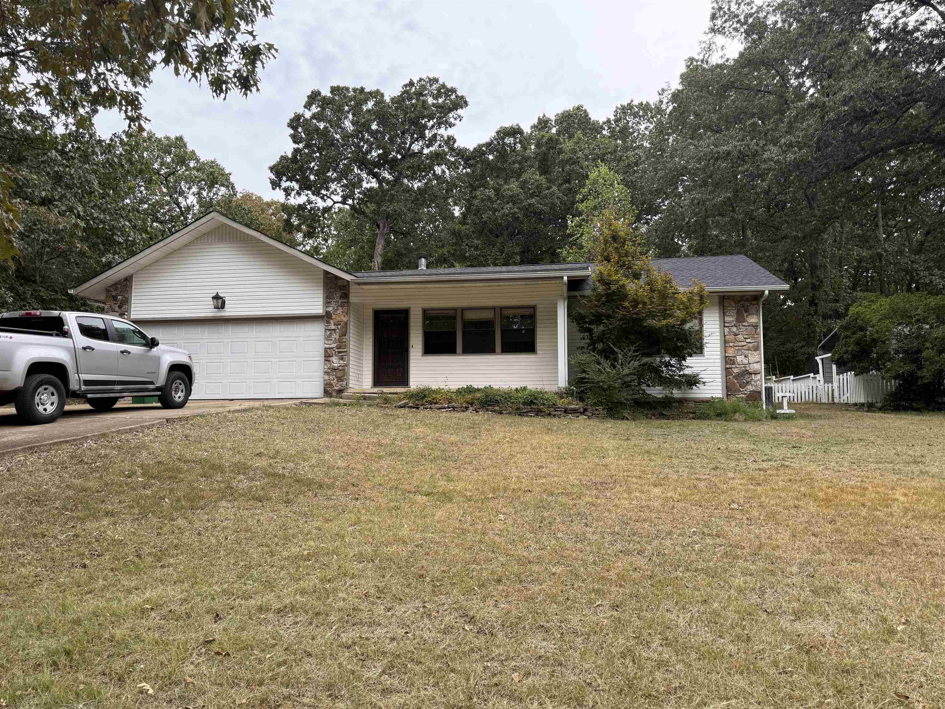 Avail Soon! 3 Bedroom 2 Bath All Electric home. 2-car garage. Large livingroom with a gas log for back-up heat. Kitchen has a refrigerator, elec stove, microwave and dishwasher.  Large dining room with back access to back covered patio and fenced in yard. Bonuses: building in back yard could be used for storage or play house! Covered picnic area and additional covered carport.  Super spacious yard!  If you need lots of space...this is it!  One small dog permitted with pet deposit. Each adult must complete an application.  $39 added to rent to cover pest control, liability insurance and credit reporting services.