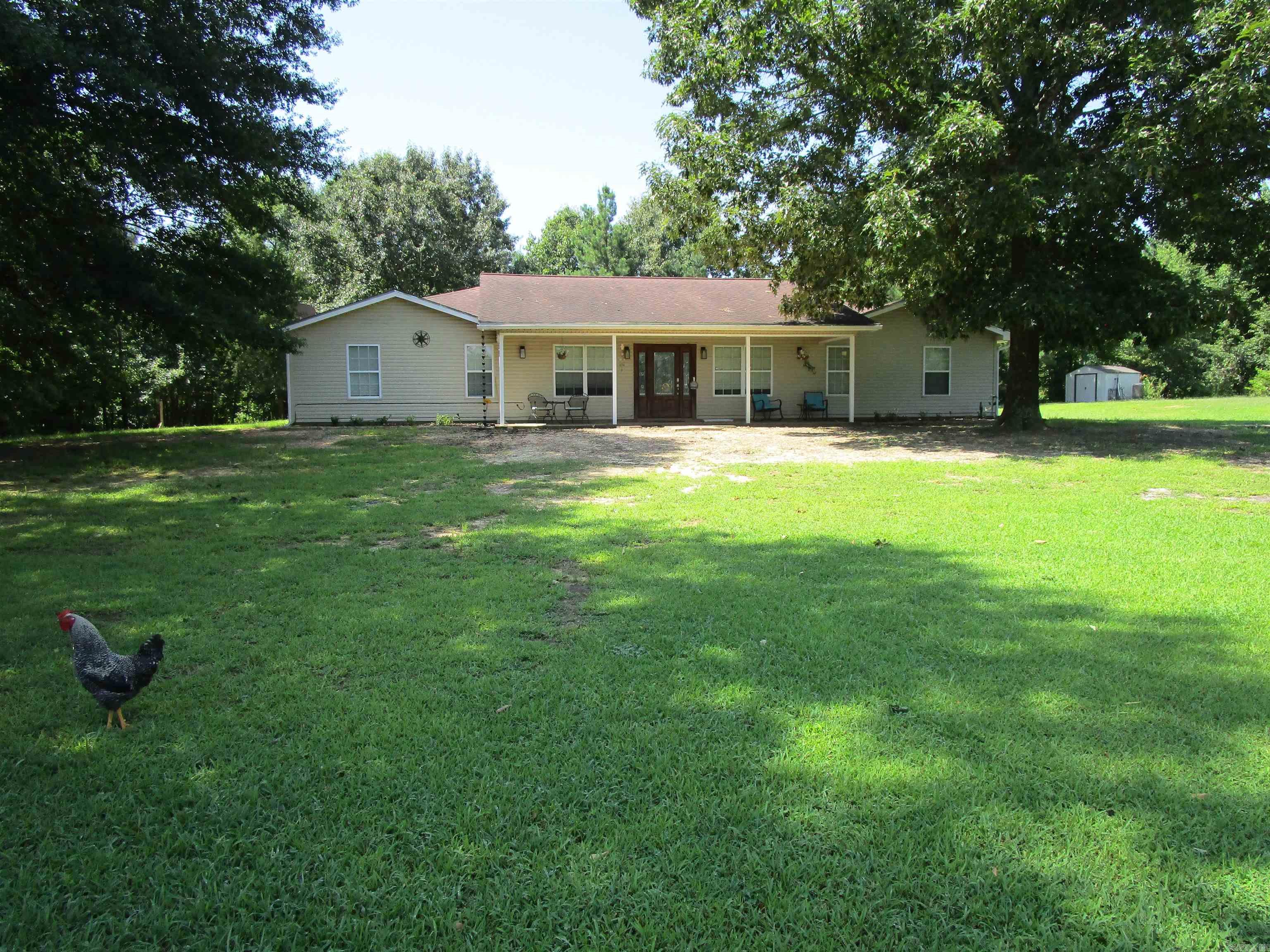 Currently operating as a retreat.  Located around the base of the western end of the Ouachita Mountains close to trails, parks, and world class kayaking, The property will encourage you to sit outside, buy farm animals, and enjoy countryside living at its finest.  The home features 4 with an office area or 5 bedrooms all on one level.  Living, kitchen and dining area are combined and is great for family gatherings.  The master bedroom is oversized with a remodeled bathroom and provides access to the outside patio area.  If you are looking for a larger home with acreage or just enjoy the outdoors and a slowed down lifestyle, this property should be on your list to see in Central Arkansas.