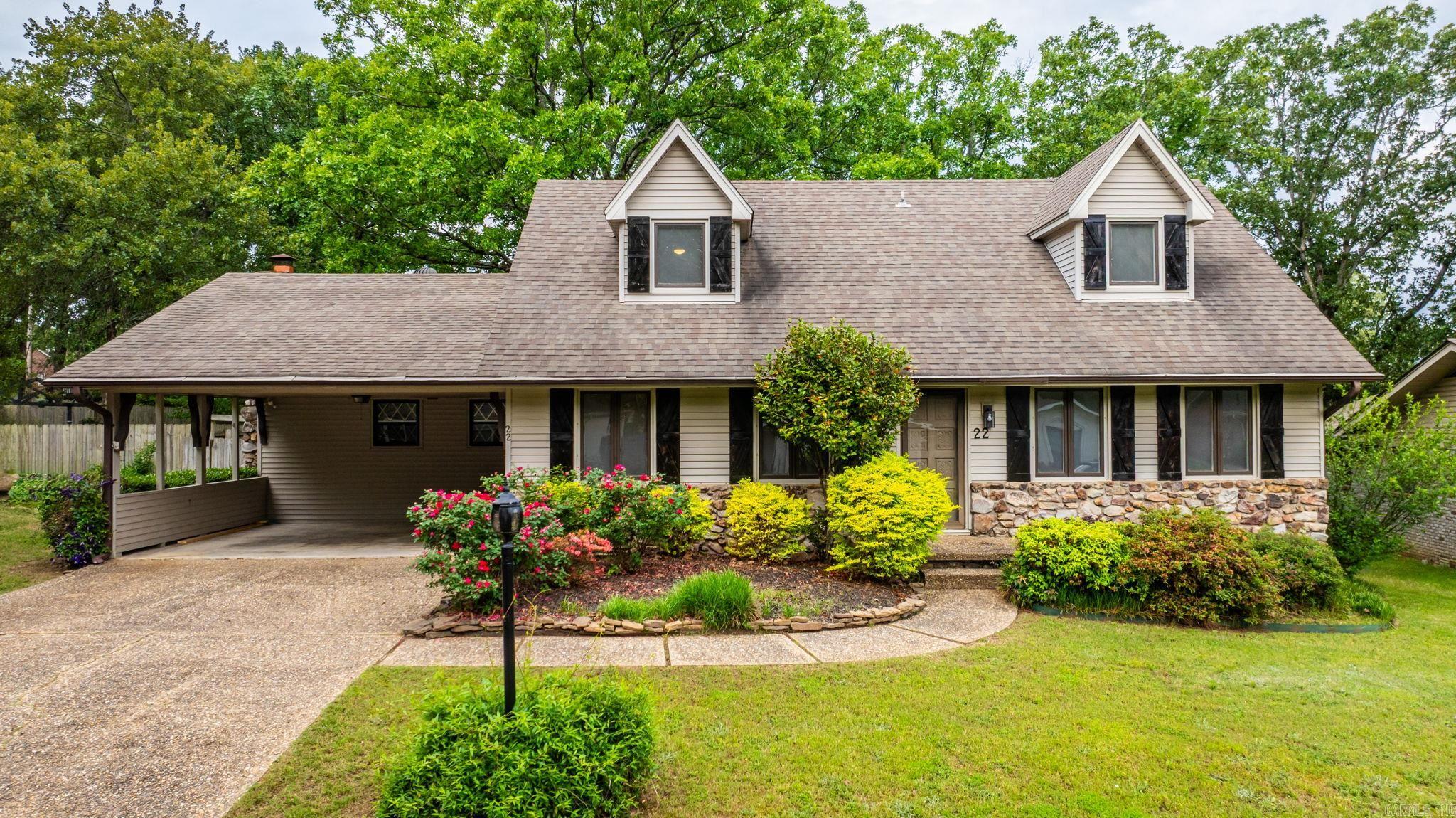 This beautifully updated 4-bedroom home in the desirable Colony West Sub. is full of upgrades & charm. The listed SF does not include the 187 SF sunroom, which features AC & large windows. Inside, you'll find new LVP flooring throughout & updated tile in one of the baths. Both bathrooms - one on each level—have been completely remodeled & now boast stylish double vanities. The kitchen shines with new quartz countertops, a ceramic tile backsplash, updated sink, garbage disposal, dishwasher, & hardware. A spacious bar with a decorative exposed cabinet wall adds flair. The den features a redesigned fireplace complete with tile work, new mantle floating shelves, gas starter & gas logs. New lighting fixtures and ceiling fans have been installed throughout the home. The living room welcomes you with a beautiful accent wall, and the entire interior has been painted. Kids & pets will love the oversized fenced backyard & the newly painted, extra-large deck is ready for your next outdoor gathering. The layout includes two large living areas, sunroom, two bedrooms upstairs, two down, & two baths. Plenty of closet space & a shop or hobby room. Agents see Remarks!