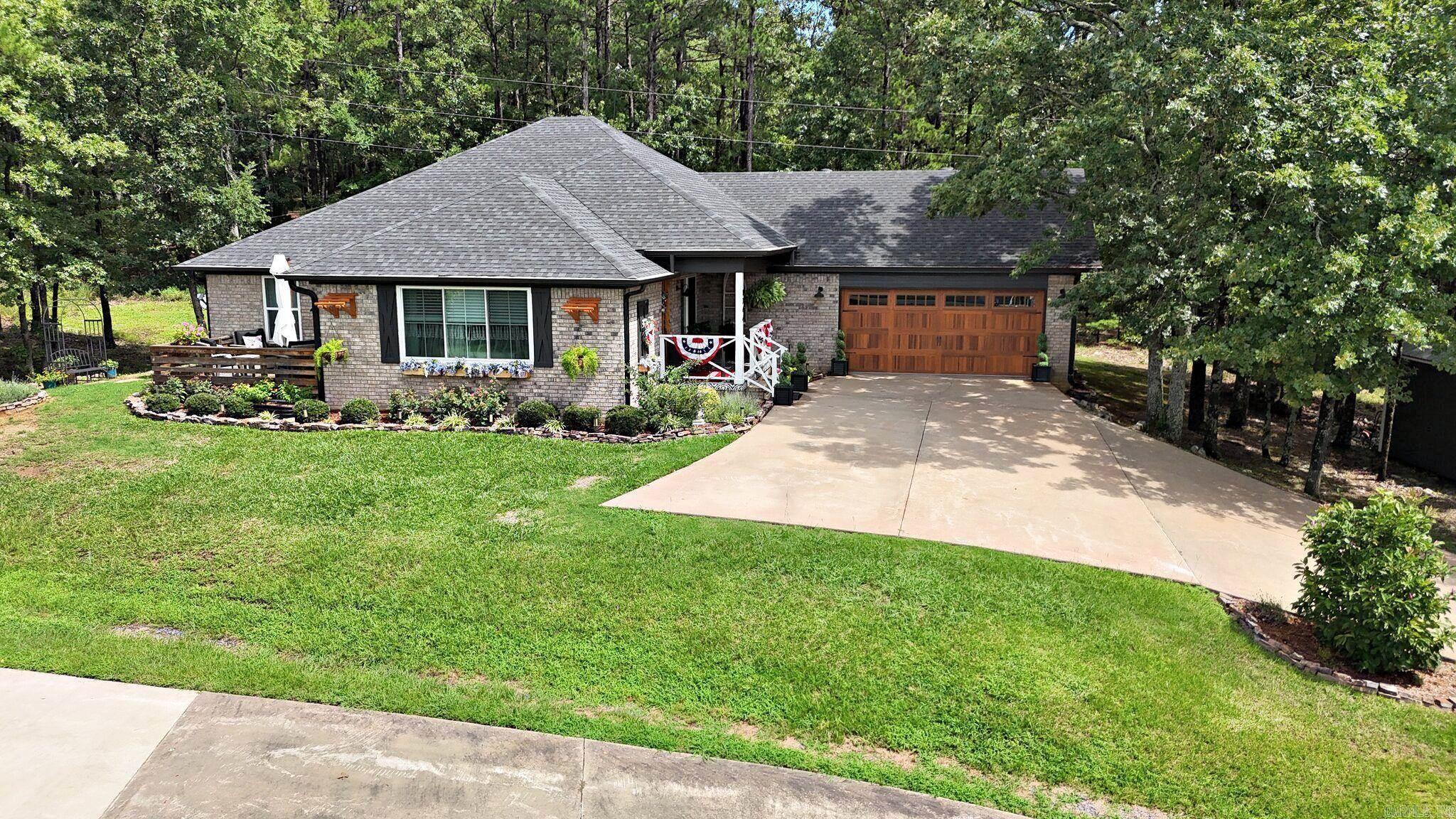 Welcome home to this charming 3-bedroom, 2-bath brick French Country Cottage nestled in a quiet cul-de-sac neighborhood. This beautifully updated home offers timeless curb appeal paired with modern upgrades throughout. The seller reports numerous improvements completed within the last four years, including a new roof, HVAC system, water heater, flooring, windows, exterior doors, light fixtures, and deck boards. The kitchen and both bathrooms have been tastefully remodeled, featuring stylish finishes and quartz countertops that add elegance and functionality to the heart of the home. Enjoy comfortable living spaces, abundant natural light, and a thoughtfully designed floor plan perfect for everyday living and entertaining. Step outside to relax on the refreshed deck and appreciate the privacy and tranquility of this desirable neighborhood setting. With major systems already updated and renovations completed, this move-in-ready home offers peace of mind and exceptional value. Don’t miss the opportunity to make this beautiful French Country Cottage your next home!