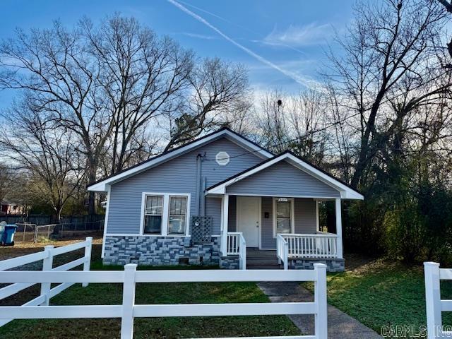 Beautifully remodeled 3-bedroom, 1-bath home with stylish updates throughout. Recent improvements include luxury vinyl plank flooring, central HVAC, metal roof, vinyl siding, updated cabinets, sheetrock, and a refreshed tub/shower surround. A detached storage shed provides additional space for tools, lawn equipment, or hobbies. The home also features a gas cook stove, kitchen appliances, and washer/dryer hookups. Move-in ready with major updates already completed—schedule your showing today!