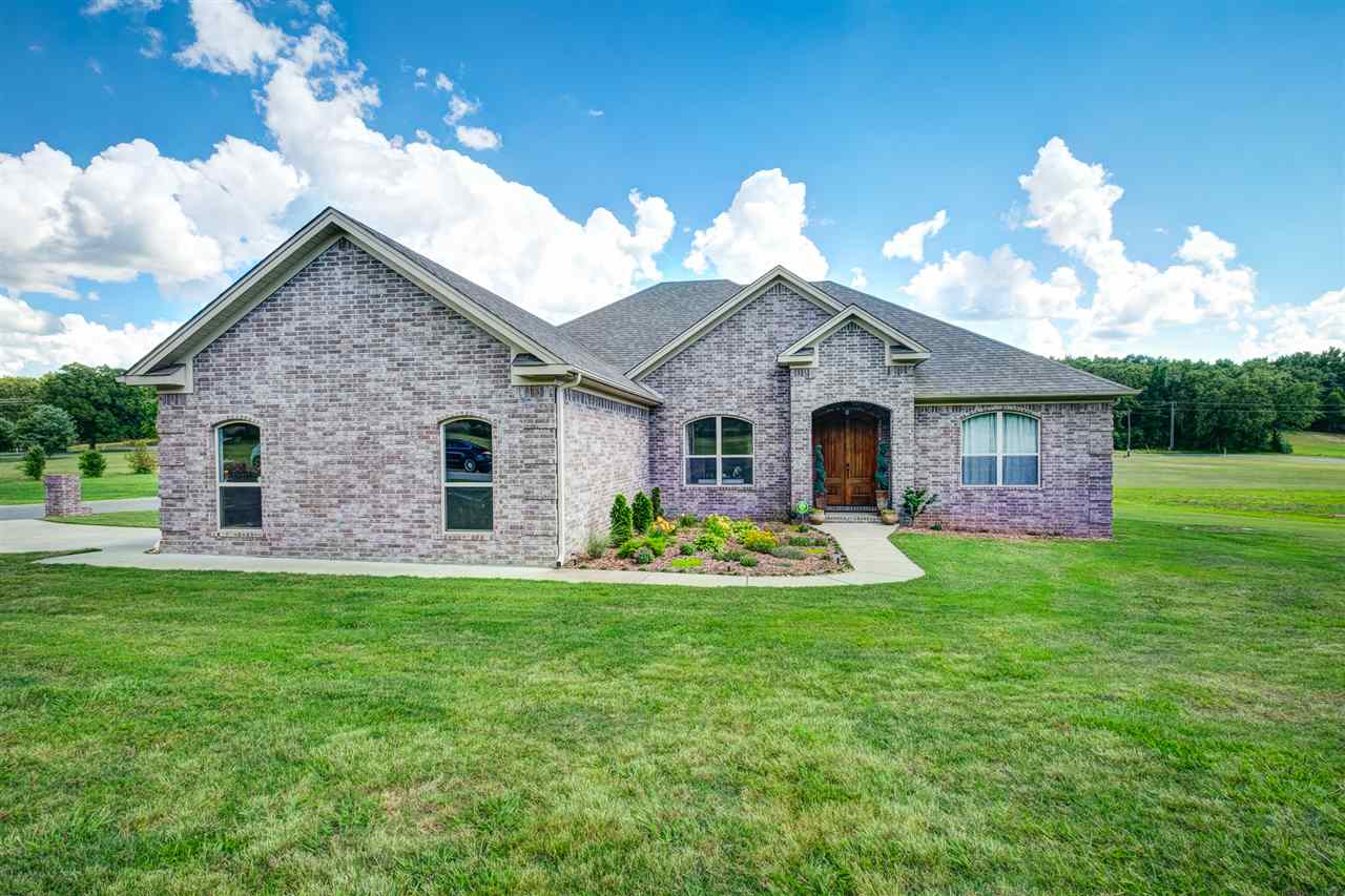 Gorgeous newer home w/ amazing open floor plan on .68 acre! Modern, stunning aesthetics w/ "wood" wide plank vinyl floors, clean lines, & fantastic light! Chef's kitchen w/ granite & lots of counter/cab space.  Open DR concept brings kitchen & great room together.  Inviting, spacious master ste & tranquil spa like bath, tub & separate shower & dream closet!  3 adorable beds & 2nd bath on right side of home.  All ceilings 9+ feet. Large side loading gar.  Portable tornado shelter doesn't convey. Alarm ready.