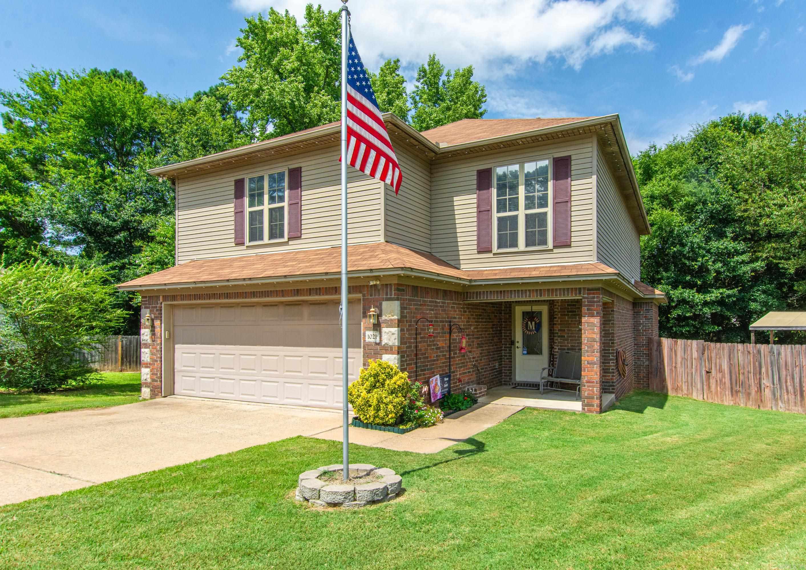 This charming 4-bedroom or 3-bedroom home, with a bonus room or flexible space, is nestled in a cozy cul-de-sac. It features a warm fireplace, a spacious deck, and a host of improvements. These include a 12x30 shop with electric power, an 8x8 pool storage building, exterior LED lights, an alarm system with four security cameras, a 21-foot above-ground pool with a deck, and a new roof installed in 2021. The home also boasts newer appliances and a large primary suite with a jacuzzi tub and a walk-in closet. For added safety, there’s a sturdy 4x6 shelter in the garage. Benton Schools.
