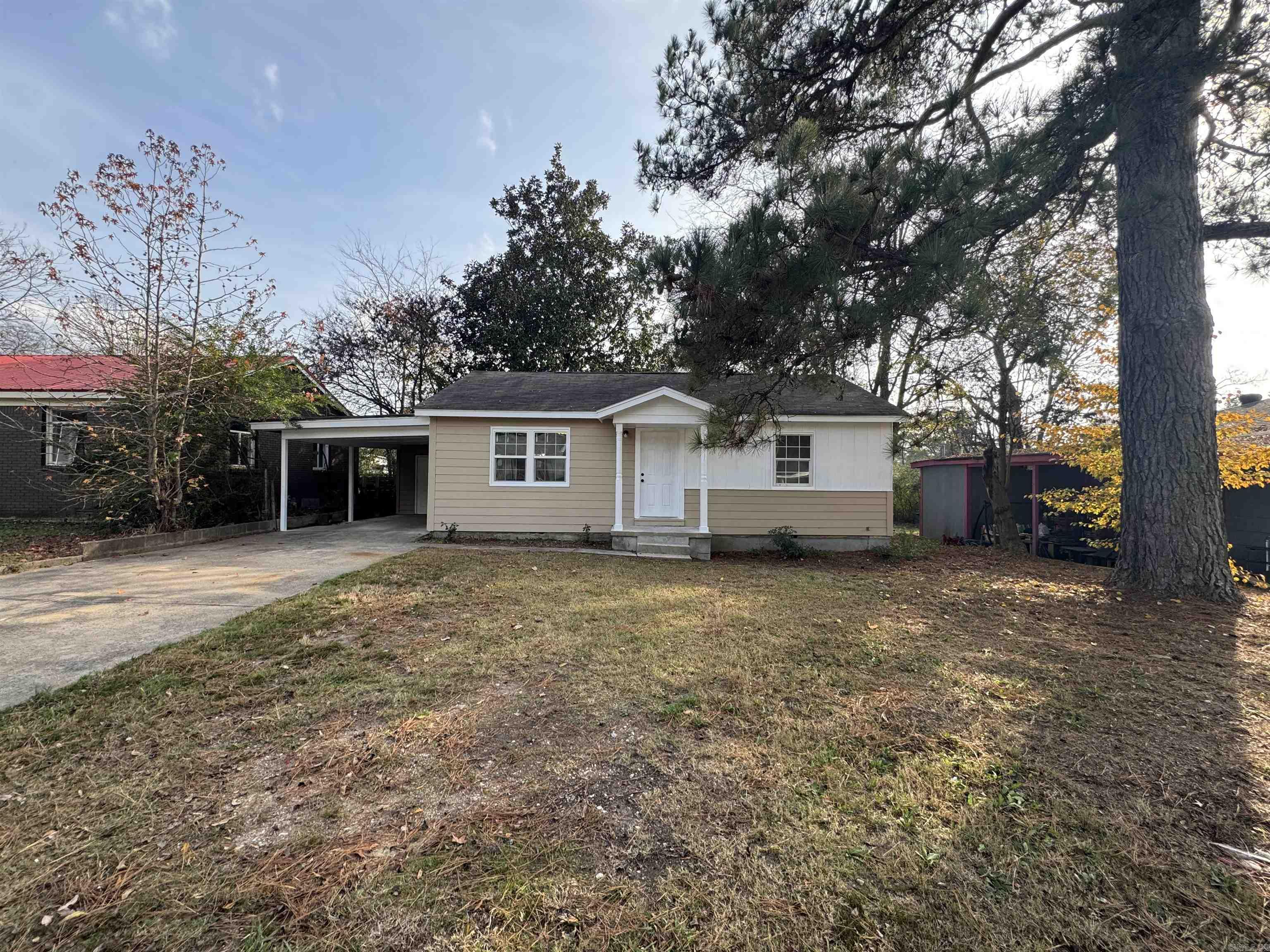Completely remodeled and move-in ready, this charming 2-bed, 1-bath home offers modern comfort in a great location. Nearly everything is new—fresh paint, new flooring, fully updated kitchen and bathroom, and stylish granite and quartz countertops throughout. A brand-new HVAC system adds peace of mind and energy efficiency.  Outside, you’ll enjoy a convenient carport and a spacious yard with room to relax. Whether you're looking for a comfortable place to call home or a solid investment property, this house checks all the boxes.  Located within walking distance of Benton High School, this home offers unmatched convenience in a quiet, established neighborhood.  Don’t miss this beautifully updated property—schedule your showing today!