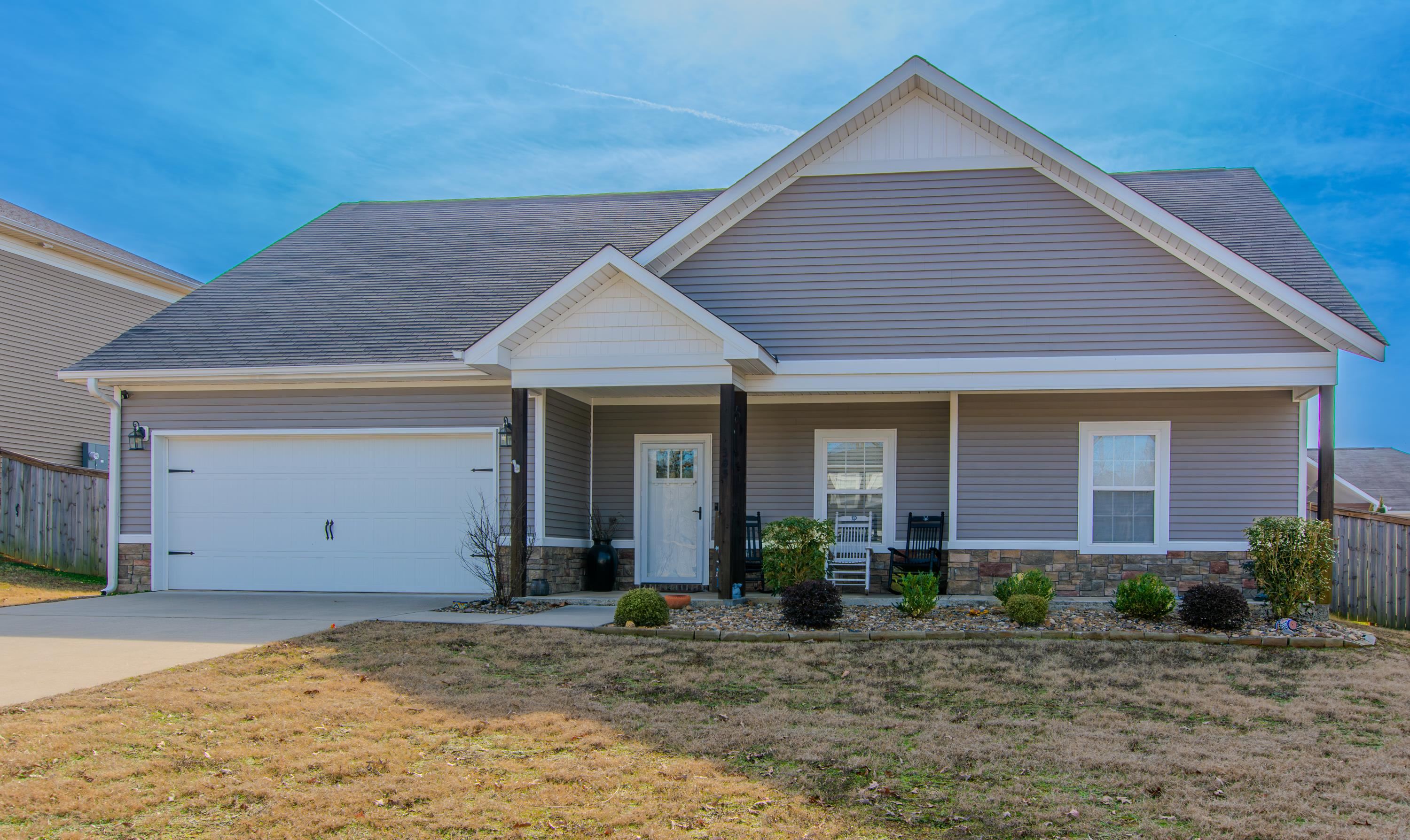 Absolutely adorable home.  Large great room open to kitchen and dining area.  Split bedroom plan.  Great natural light.  Good sized bedrooms. Wonderful front porch. Fenced back yard.  Patio off kitchen.   Refrigerator, washer and dryer will convey at no value with acceptable offer. Move in ready. See agent remarks