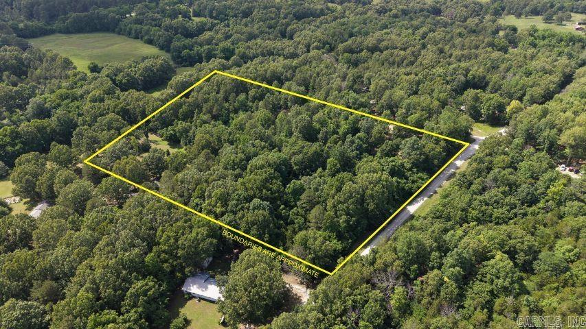 Perfect home site in the country with city water and electric available. This 5.17-AC M/L property is just the right size to provide privacy, but not too much to take care of. Mostly level, this property is heavily wooded adding to the privacy this lot offers. Sits on a county-maintained road and only 5 miles to town. Fish, swim or boat the Crooked Creek or Buffalo River or enjoy one of the beautiful parks all only minutes away. Only light restrictions and mobile homes are allowed. Don’t miss this one, call for showing today!