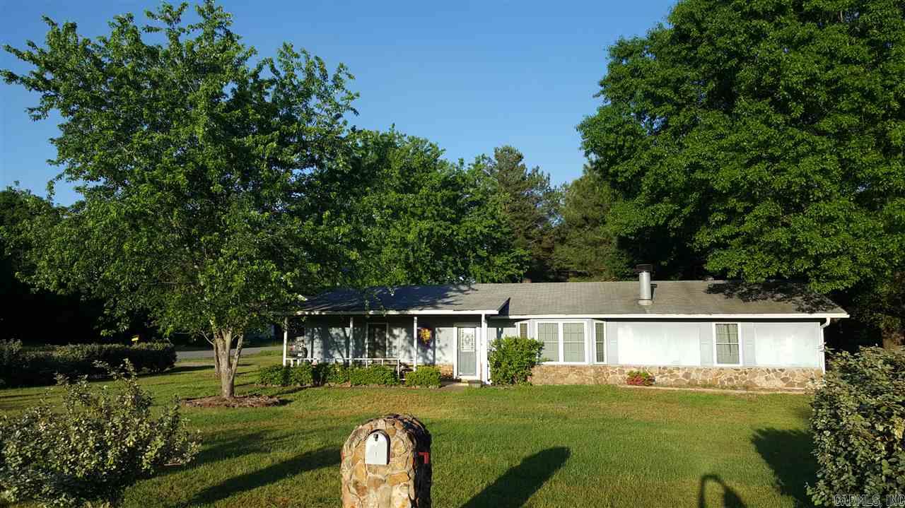 Best of both worlds! This home is located just out of city limits in conway on near an acre yet in the vilonia school dist. It is on a very large corner lot with beautiful shade trees. large deck that backs up to an insulated shop & 2nd garage. You feel rite at home when you walk in the front door. Large living area with master apart from guest rooms with a BONUS room that could be office or game room. Schedule to see soon!!