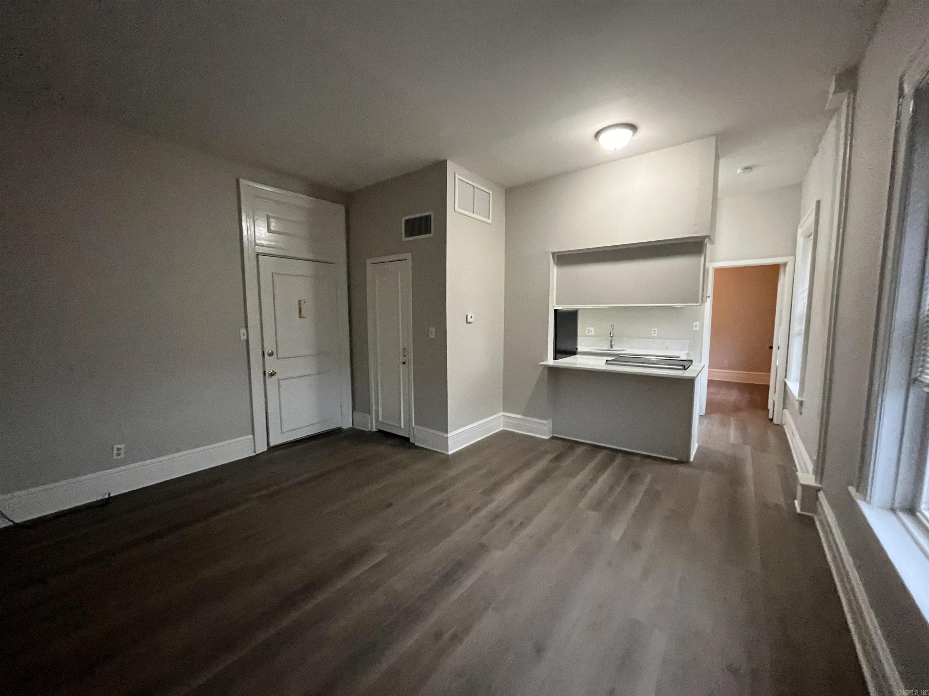 Completely remodeled, spacious one bedroom apartment. New flooring, new quartz counter tops, new stainless appliances, beautiful, retiled bathroom. Parking on premises. Deposit same as rent. No pets. $50 application fee.