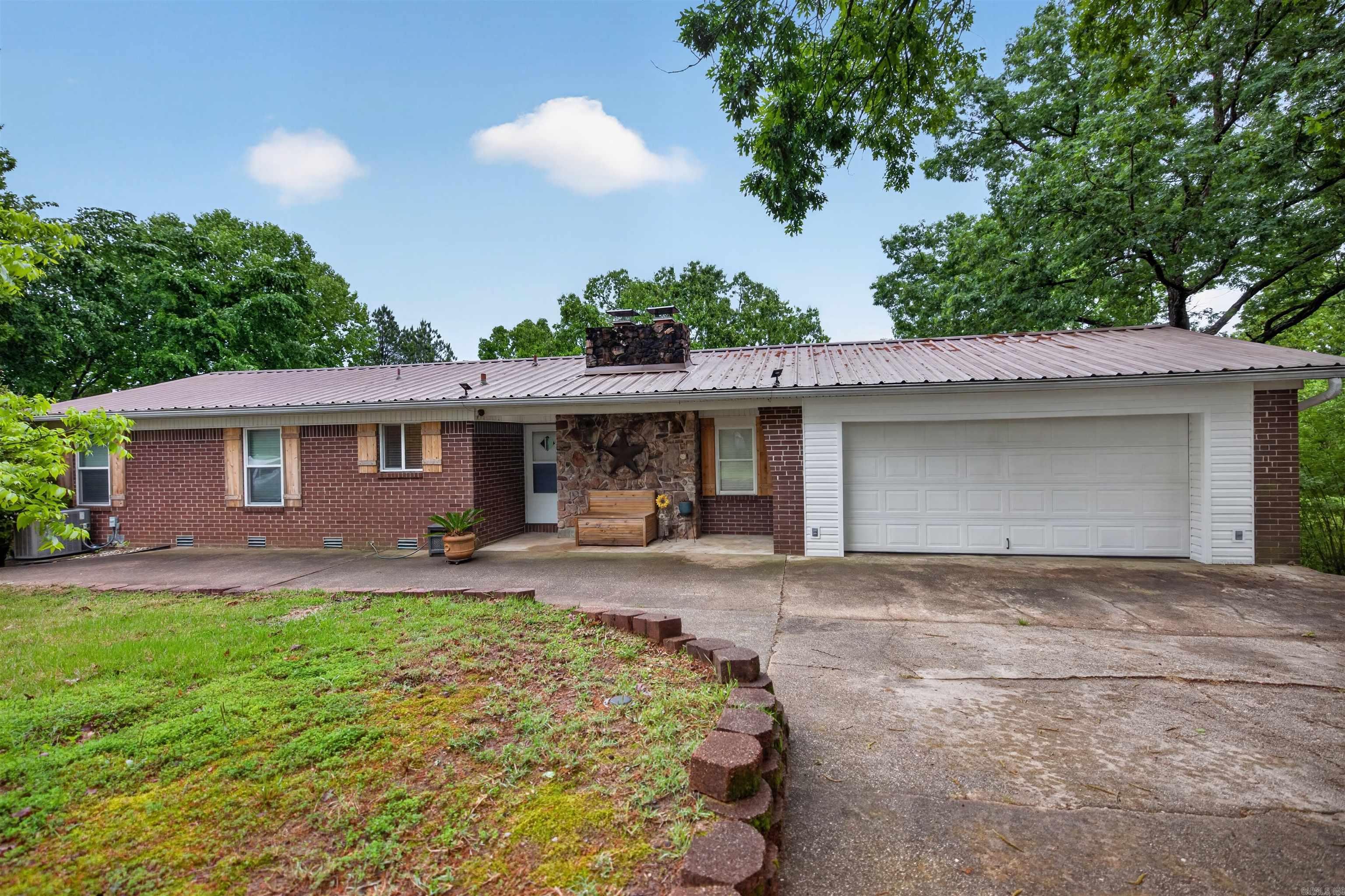 If you’ve been looking for a home with character, space, and flexibility… this one deserves a look in person.   1,737 sq ft  2 bedrooms | 2 baths 2 separate living spaces  Guest house with private bath Walking distance to Lake Catherine  2 car garage Sunroom + covered patio + open air deck  The setup here gives you options… mother-in-law quarters, guest space, weekend lake retreat, possible Airbnb potential, or simply room to spread out and enjoy life a little more.   And pictures honestly don’t do the feel of this property justice. The peaceful setting, multiple living areas, and outdoor spaces make this one you truly need to walk through to appreciate.  Homes with this kind of flexibility near Lake Catherine don’t come along every day at this price point.  Call or text me to schedule your private showing before someone else grabs it!
