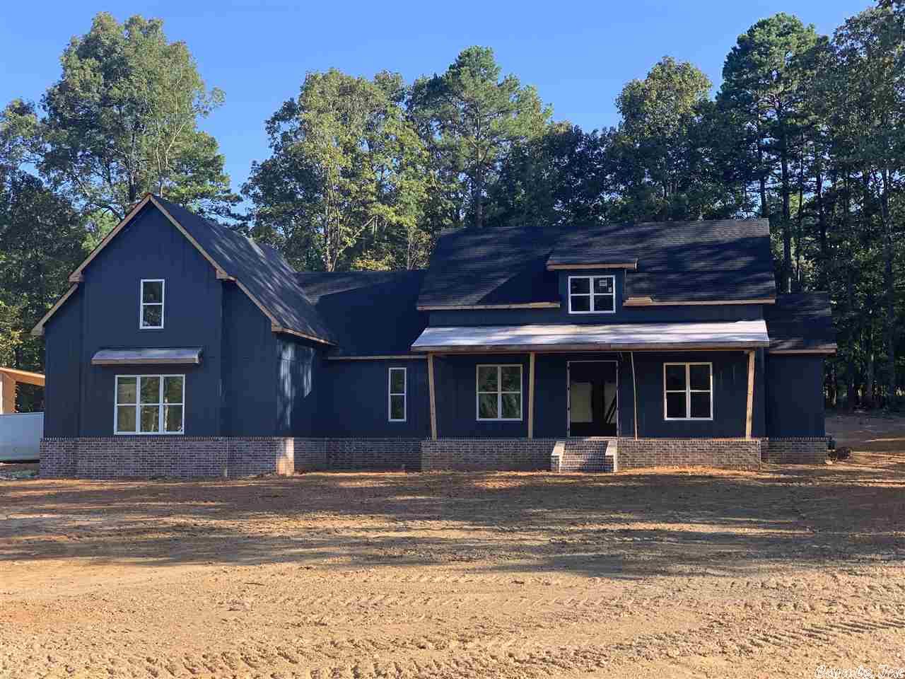 NEW CONSTRUCTION LP siding and brick exterior. Open floor plan, vaulted ceilings in living room. 4 bed, 3 full baths. Large bonus room with tall ceiling upstairs, along with 1 bedroom and full bath. Natural stone countertops throughout house. Large double vanity in master with walk-in shower and free standing tub.