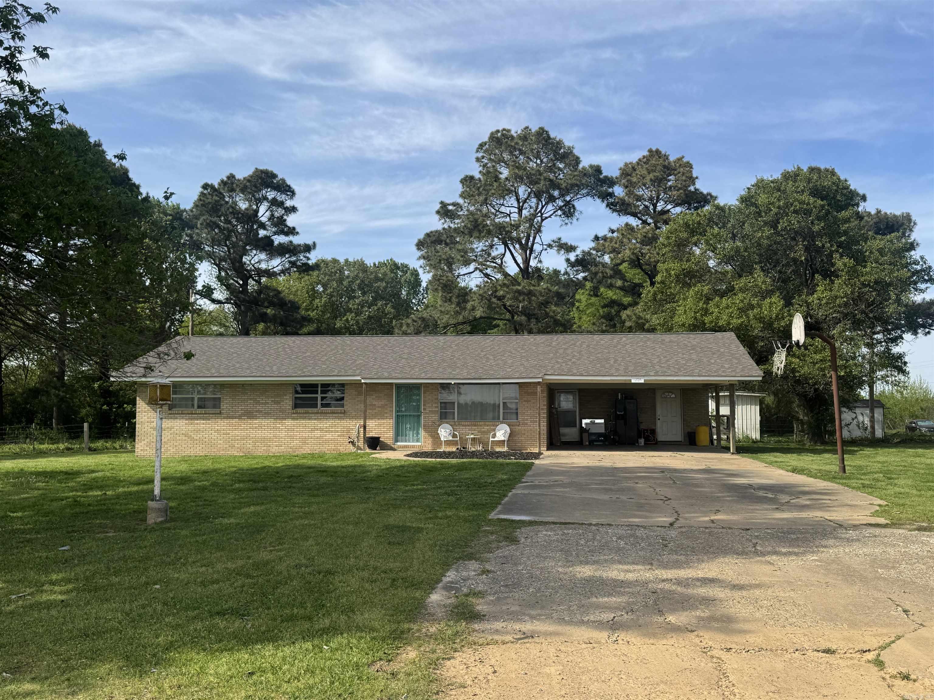This unique multi-home property just outside the city limits offers endless possibilities on approximately 2 acres of land. Featuring three separate houses, it’s the perfect setup for multi-generational living, rental income, or a combination of both. Located 1 mile Northeast of Stuttgart.  The middle home has been recently updated with new flooring and fresh paint throughout, creating a clean and inviting space. It offers a spacious living area and the convenience of a separate laundry room. The property includes: One 3-bedroom, 2-bathroom home One 2 bedroom, 1 bathroom home One 1-bedroom, 1-bathroom home In addition to the homes, you’ll find three sheds and a large storage building, providing ample space for tools, equipment, or hobbies. Whether you’re looking to live in one home and rent out the others, or bring the whole family together while still maintaining privacy, this property is a rare opportunity with incredible flexibility and potential.
