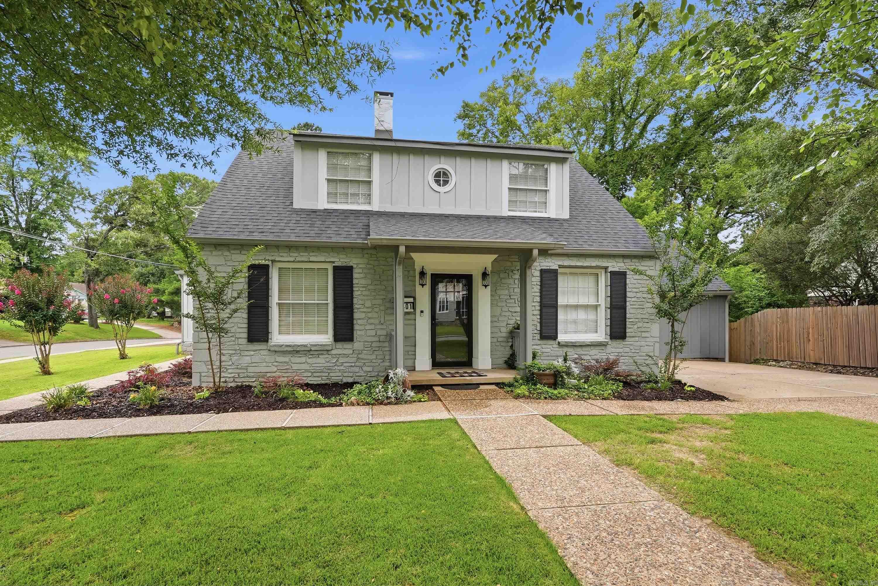 Nestled on just over an acre, this beautifully restored 1940 home offers a rare combination of historic charm, modern luxury, and exceptional space—an opportunity that's seldom found in one of Central Arkansas's most beloved neighborhoods. Welcome to 3401 Ridge Rd in the Historic Park Hill District.  Featuring 4 spacious bedrooms, 3 full bathrooms, and 2 half bathrooms, this thoughtfully updated home perfectly blends the craftsmanship and character of the 1940s with today's modern conveniences. From its timeless architectural details to its beautifully renovated interiors, every space has been carefully designed to honor the home's history while providing comfortable, everyday living.  The expansive floor plan offers room to gather, entertain, and unwind, while the 3-car garage and ample additional parking provide exceptional convenience for homeowners and guests alike. Whether you're hosting holidays, enjoying peaceful evenings at home, or simply appreciating the privacy that comes with over an acre of land, this property offers a lifestyle that's difficult to find.  Call to See for yourself