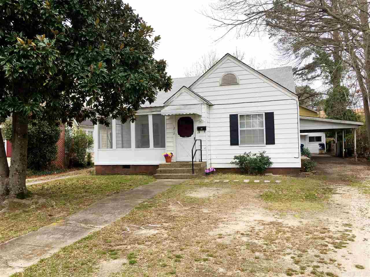 Just a little Dollhouse!!! Cute Cute Cute!!! Mint condition hardwood flooring throughout, unique built-ins, open kitchen/ dining room. All 3 bedrooms are reasonably spacious, small shop would be ideal for the man den or the hobby lover. Spring morning and evenings could be spent on the screened in porch, move in ready! Ideal for the one looking to downsize or purchase their first home! Lets look around soon!!