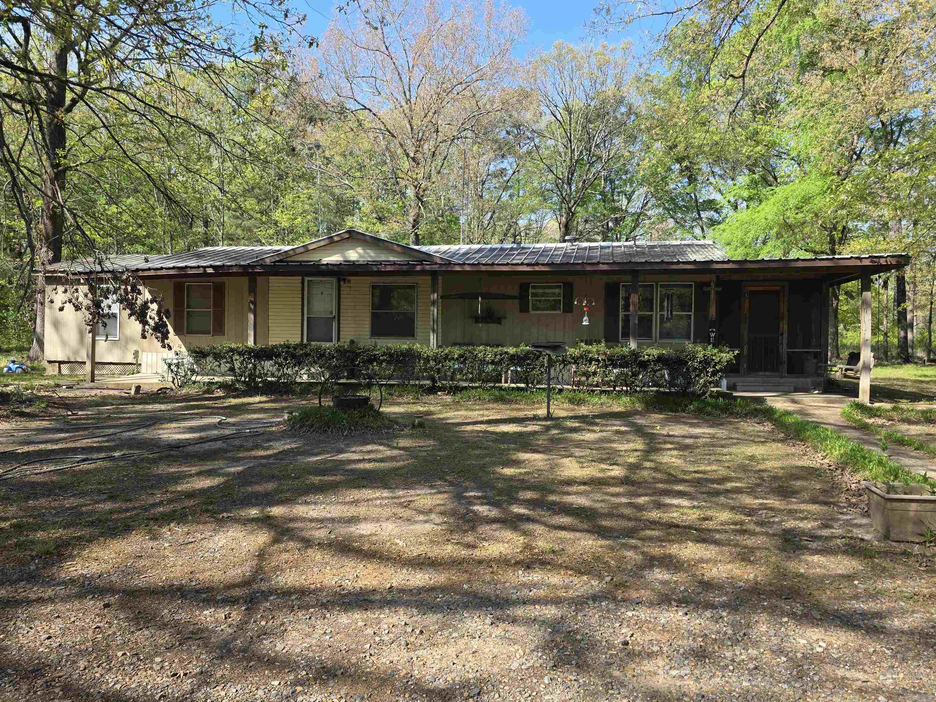 This is such a great property located in Cleveland County with lots of extras.  Plenty of love went into this place and it is just waiting for you to add more.  It has a shop with an overhead door for work projects inside and there is also covered RV parking.  Plenty of places for all your outside toys.  There is a fire pit, barbeque area, dog pen, and a garden spot.  The home is super cozy and has a bonus craft room/possible bedroom.  Give me a call to take a look!