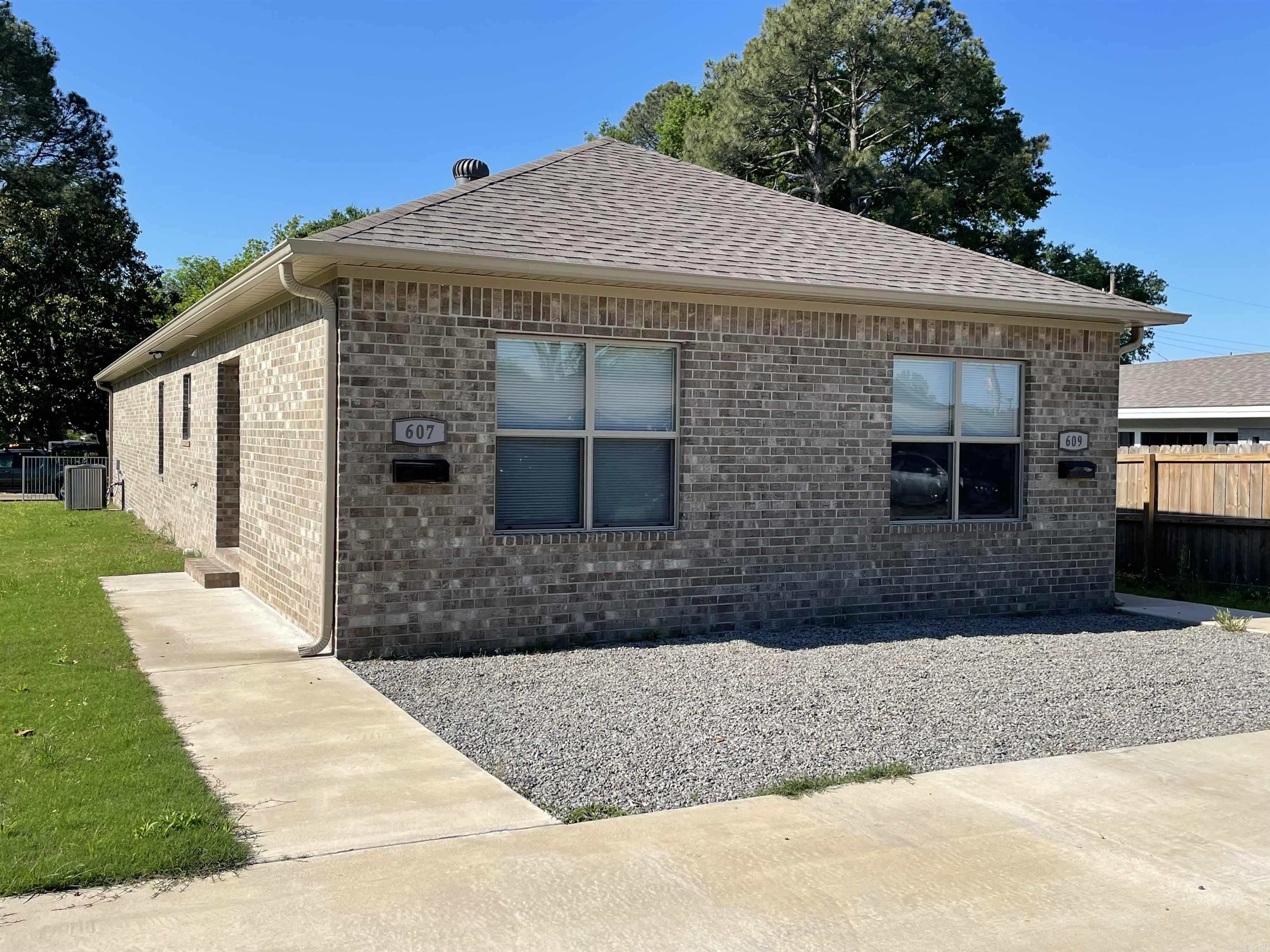 Great investment opportunity in Jacksonville! This all-brick duplex sits on a corner lot in a convenient location with quick highway access. Each unit features 2 bedrooms, 2 bathrooms, its own laundry room, and an open kitchen/living layout that feels spacious and comfortable. The large parking pad easily fits up to 4 vehicles. Whether you’re looking to invest or live in one side, this property offers flexibility and value—come see it for yourself!