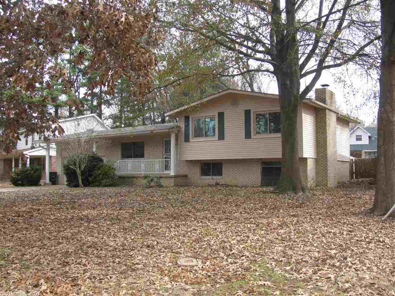 Totally Re-modeled this beautiful tri level brick home. It is just like a new home. Seller offering a home warranty. It has new carpet, all new paint, pick out your new appliances, new tile floors, new deck, a brand new face lift. This home has nice size bedrooms and plenty of room. Drive in your double garage with a large storage room.Has storage sheds in fenced in back yard. Has a fireplace in the den, open kitchen with dining area. Come and see this beautiful home. You will love it. It is move in ready.