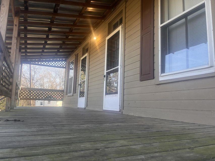 Solid older 2 bed, 1 bath home on a corner lot in a quiet part of town.   Located just a few blocks from downtown Mammoth Spring Arkansas for shopping, restaurants, and to the Mammoth Spring State Park! The near by Spring River offers a broad spectrum of activities year around! Actual taxes to be determined as this is a partial sale.
