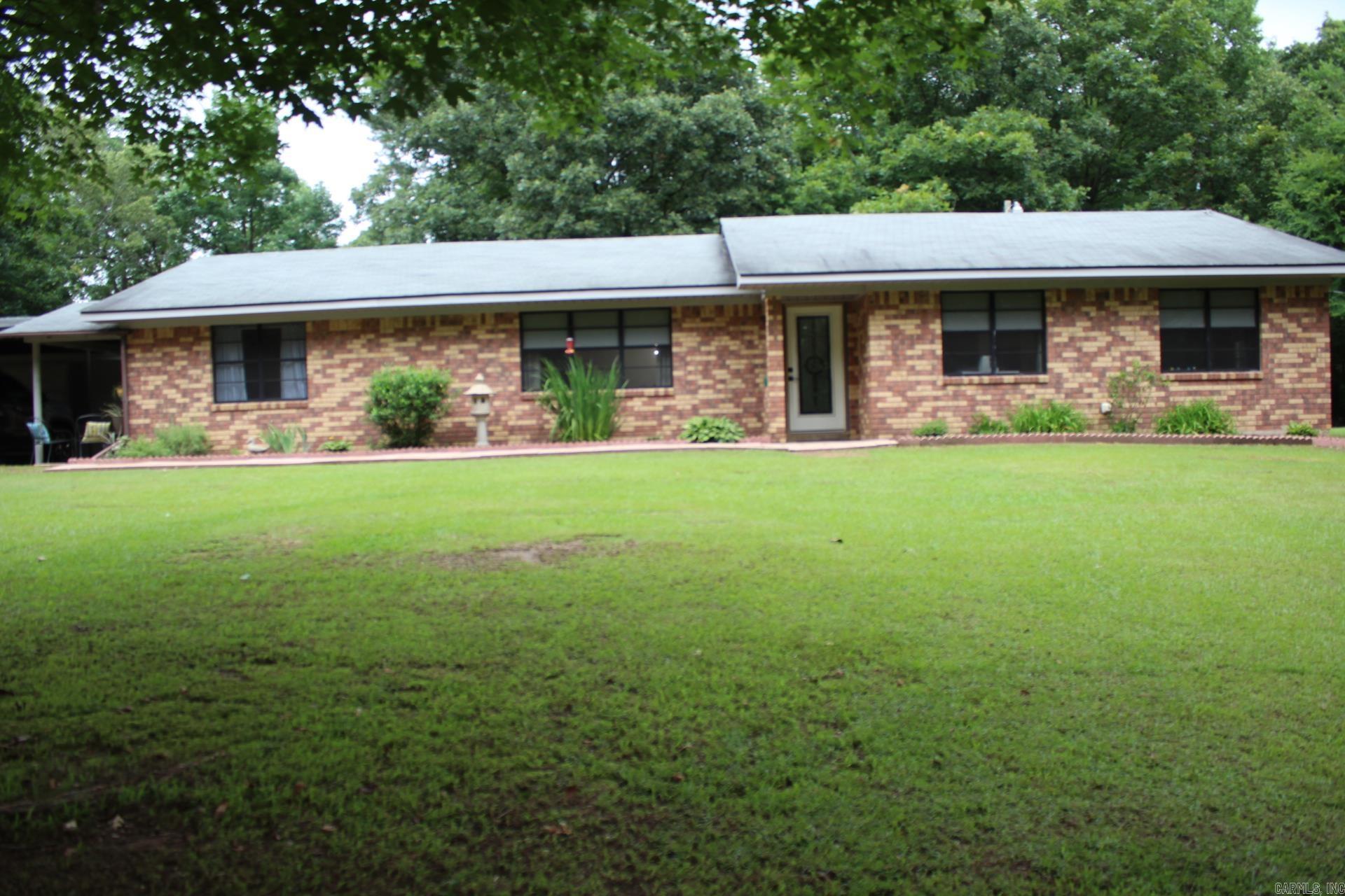 COUNTRY LIVING JUST NORTH OF NASHVILLE. 3 Bedroom, 1.5 bath with approx. 1824 Sq. Ft. of living space situated on approx. 2.13 acres.  Spacious kitchen (Range, microwave, refrigerator and dishwasher conveys with sell of home). Large family area and a bonus room (playroom) .  Property has a  separate living quarters / office with a kitchenette,  30 x 30 detached garage/shop.  Central A/C & Heat in 2020.
