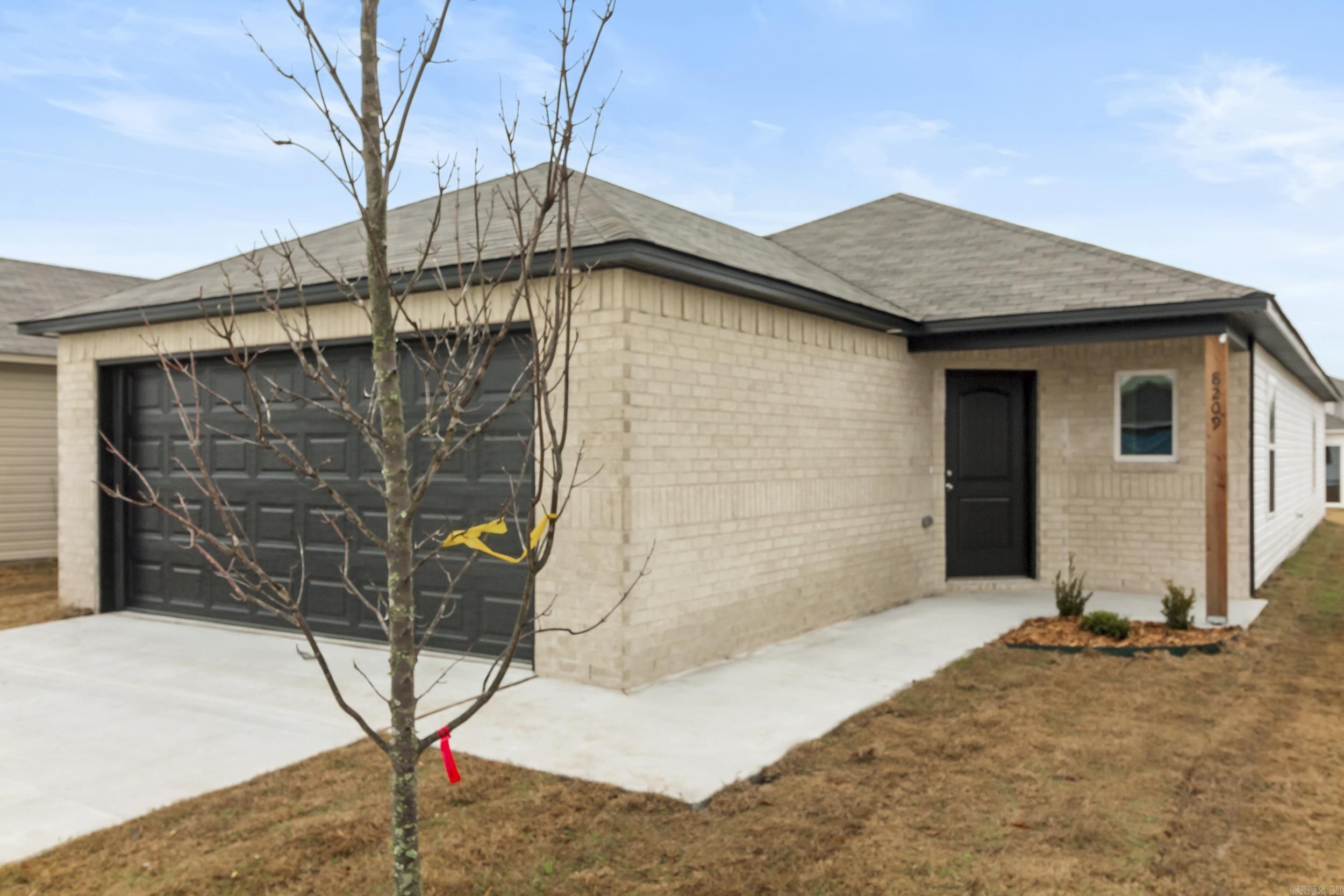 The Ridgeland plan is a sleek, modern looking plan with an attractive exterior and clever offset front door. Bedrooms 2, 3 & 4 are located just steps from their shared hallway Bathroom and the Laundry Room for ultimate convenience. Tour it today!  Thoughtful upgrades in this home: 14'x7' uncovered patio, 60" fiberglass standup shower (no enclosure) in Master Bath, plumbing faucet upgrade 2, 8" deep Kitchen sink, door bell, added cable jack, HVAC rigid duct upgrade, flush laminate bar top in Kitchen, Luxury Vinyl Plank flooring in wet areas and Living Room and adjacent hallways, raised ceilings in Living Areas and Master Bedroom per municipal requirements, fiberglass exterior doors, Cheyenne style doors, baseboards level 2, 25in wide attic stairs, double bowl vanity in Master Bath, LED disk lights in Kitchen, level 1 ceiling fan in Living Room, full sod, stainless steel appliance package.      *** AGENTS, PLEASE SEE AGENT REMARKS OR SHOWING REMARKS FOR VERY IMPORTANT INFORMATION. ***  THIS HOME IS SCHEDULED TO BE COMPLETE IN MID DECEMBER.