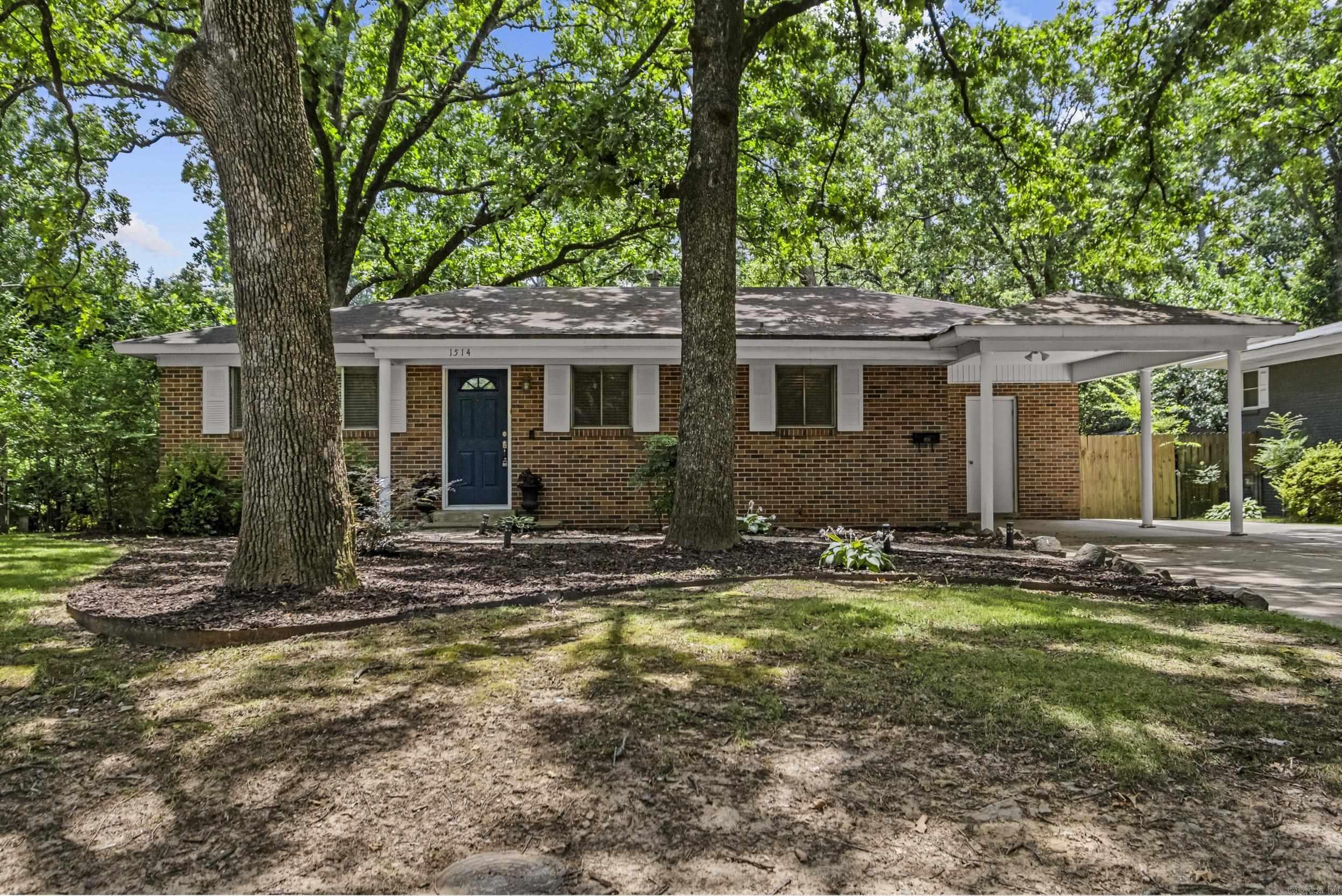 Welcome to this charming 3-bedroom, 2-bath home in the highly desirable Lakewood neighborhood! Inside, you'll find beautiful original hardwood floors, updated kitchen countertops, and a remodeled bathroom featuring a relaxing soaking tub. The functional floor plan offers comfortable living spaces filled with character and warmth. Step outside to enjoy the spacious backyard, perfect for entertaining, gardening, or simply relaxing. Conveniently located just minutes from neighborhood parks, fishing, the Historic Old Mill, shopping, dining, and all that Lakewood has to offer. Crestwood Elementary is just down the street, adding to the home's exceptional location. Don't miss your opportunity to own this wonderful home in one of North Little Rock's most sought-after neighborhoods! SEE AGENT REMARKS!