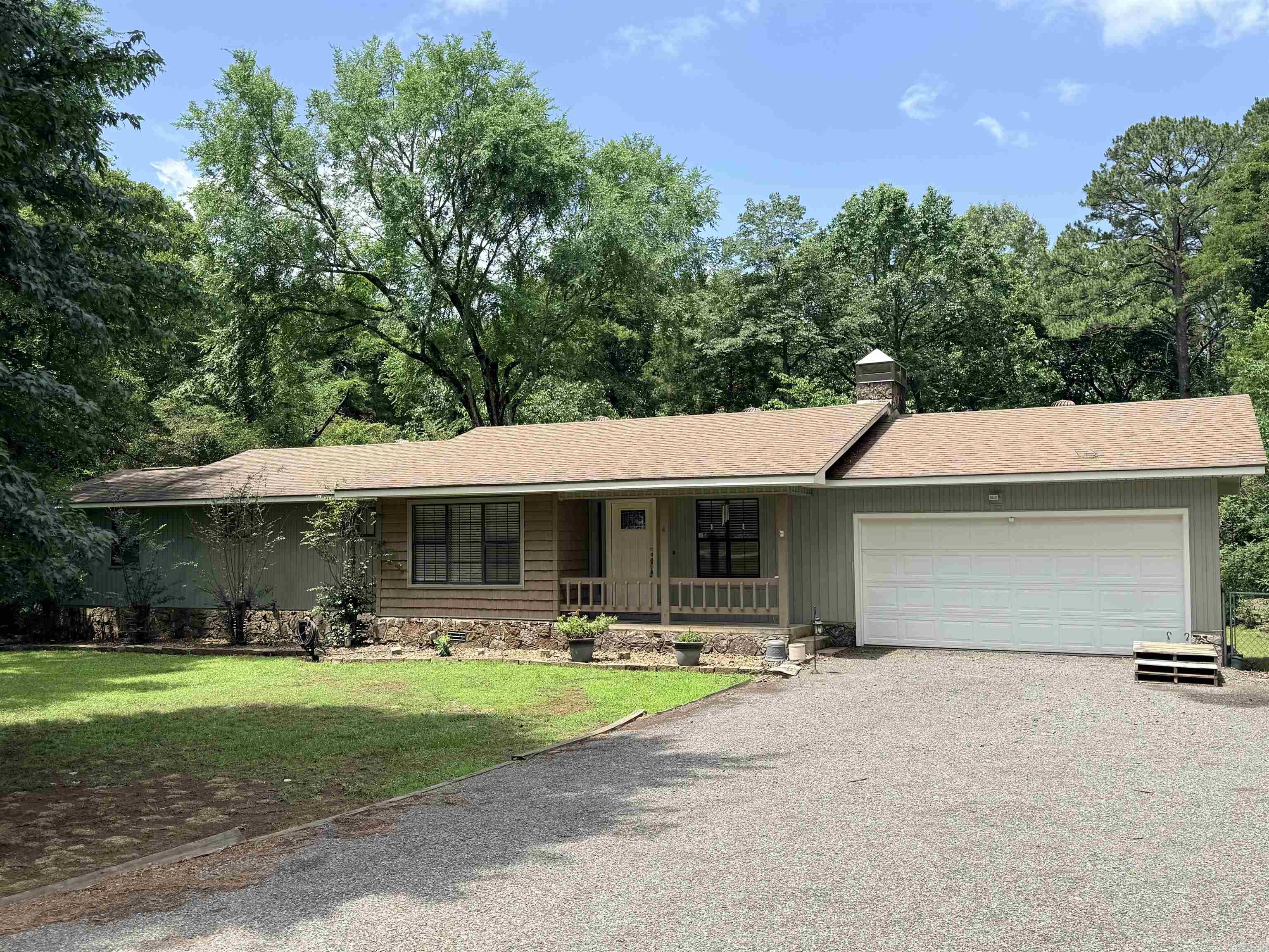 Due to No Fault of the Seller, this property is Back on the Market!!  Location! Location! Location!!  This 3 bedroom 2 bath home is just minutes from Heber Springs Rec area and still close to town and schools.  Beautiful lot with trees for privacy and a wet weather creek behind.  Enjoy the nice deck and 10-person Hot tub (approx 3 years old).  Roof and vinyl siding approx 10 years old, HVAC replaced 2018 and water heater 2023.  Privacy fence added for extra privacy while enjoying your time on the deck or hot tub.  Backyard is fenced for your pets.  Deck and handrails off master bedroom is being replaced.  Plenty of driveway to parks extra vehicles, boat or RV.  Call for a showing!!  (Half a mile to Heber Springs Park)