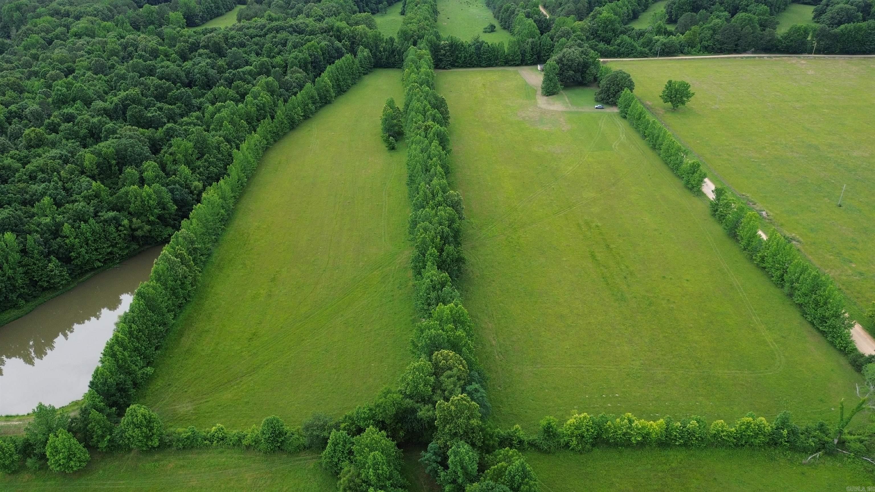 Build your dream home on this beautiful vacant tract offering the perfect blend of open space and natural beauty. Mostly cleared and level, this property provides an ideal building site with plenty of room for a home, shop, garden, or recreational space. A scenic creek winds through the property, creating a peaceful setting and attracting abundant wildlife for nature lovers to enjoy. Conveniently located close to paved road access, you'll appreciate the balance of privacy and accessibility. Whether you're looking for a homesite, weekend retreat, or investment opportunity, this property offers endless possibilities in a quiet, serene environment. Don't miss your chance to own a piece of the countryside and create the lifestyle you've been dreaming of!