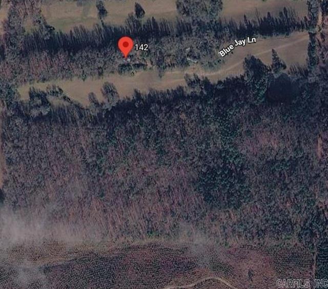 50 wooded acres with a pond and joins Weyerhaeuser at the SE corner. Private lane dead ends into this majestic property. The utilities are already in place for you. 2 wells, septic and electric are all here on this old home place. There are two older mobile homes on the property that have no value, one is a 1993 and the other is a 1996. Call for a showing. This is an estate sale subject to judge's approval.
