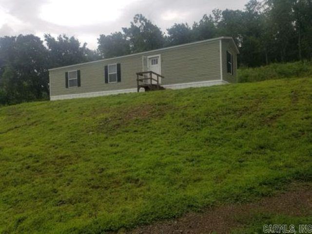 charming 2 Bed, 2 Bath Mobile Home in Peaceful Washington County Setting  This well-maintained 2-bedroom, 2-bath mobile home offers comfort and functionality on a quiet dirt road in scenic Washington County. The home features durable linoleum flooring throughout, an open kitchen with electric stove, dishwasher, and refrigerator included.  The master suite boasts a spacious two-sink vanity and a private shower. The guest bathroom includes a convenient tub/shower combo. Enjoy the simplicity of country living with essential amenities already in place.  Perfect for first-time buyers, downsizers, or investors looking for rental potential. Don’t miss this affordable opportunity to own a piece of Washington County!