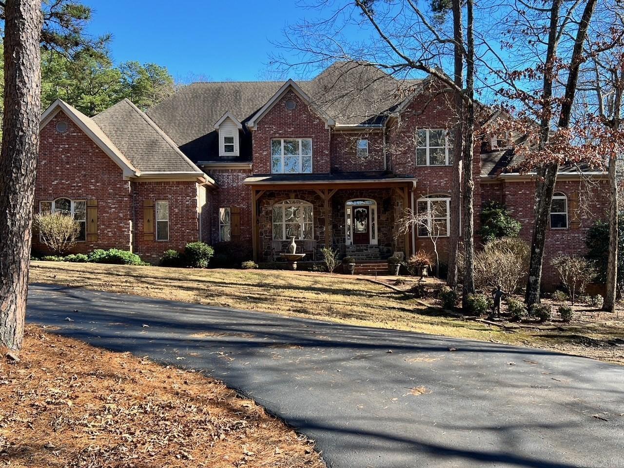 Located in the desirable Ferncrest Estates, this exceptional single family residence offers the perfect blend of luxury and privacy. It is situated on 4.95 acres with additional 4.82acres also available. This property is a true private retreat. The home has 5103 sq. ft. & features 4 BR, 4.5 BA, thoughtfully designed for everyday living and entertaining. The primary suite is located on the main level with a beautifully appointed primary bath and large closet. Upstairs you will find an additional 3 BR's, 2 BA, & spacious game room. At the heart of the home is an updated kitchen with quartz countertops, new appliances including 2 dishwashers, 6 burner gas range, built-in fridge and Sonic ice machine. The kitchen is open to the breakfast room and hearth room. For outdoor living, there is a large deck as well as a gunite pool with pergola that provides a tranquil resort like atmosphere. A 5 car garage provides ample space for storage and vehicles. There is a living area above, perfect for guests, office or additional flex space. It is 544 sq. ft. that is not included in the sq. footage. All of this great property is  just minutes from the Promenade. See agent remarks.