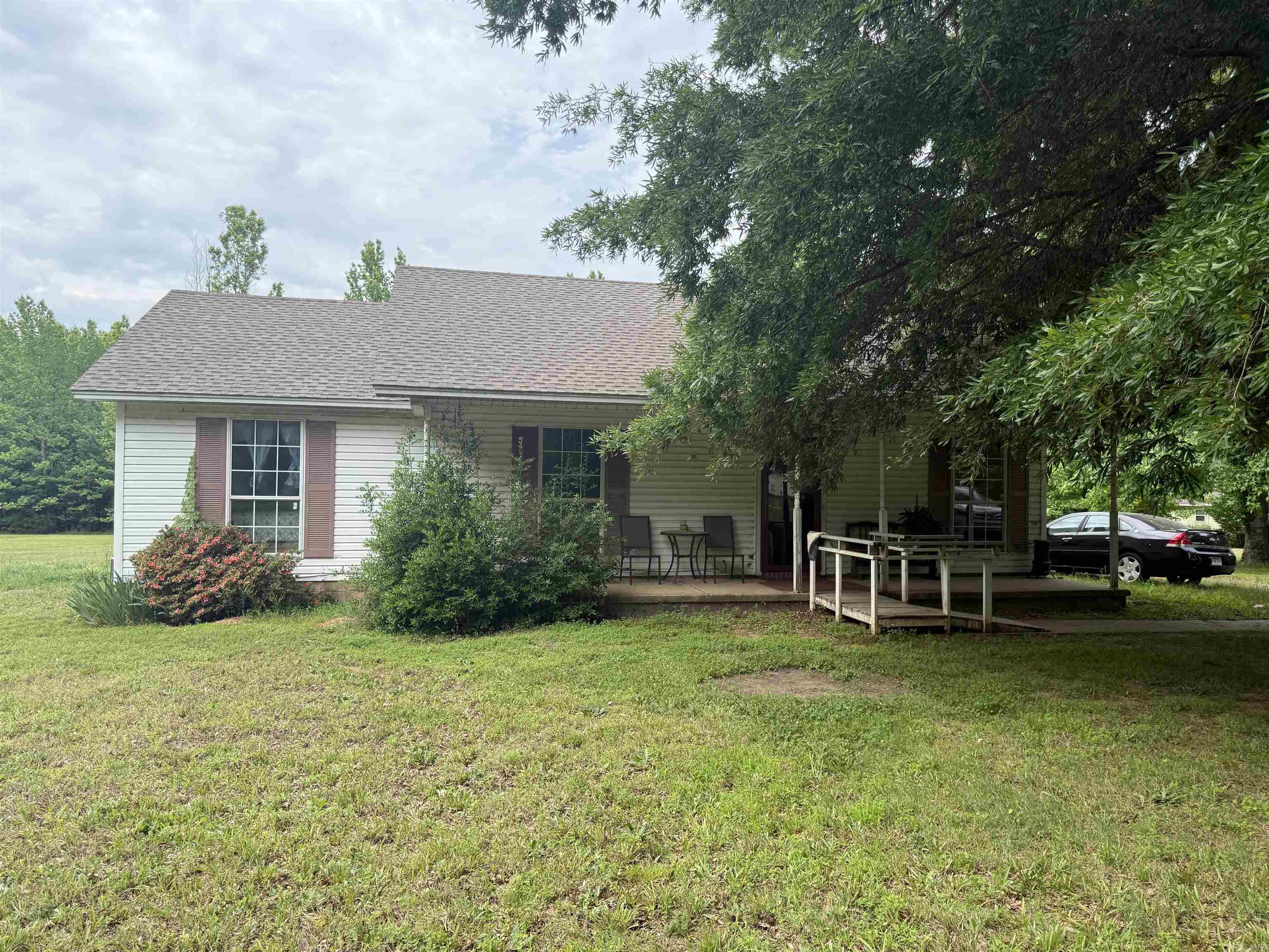 Enjoy the perfect blend of privacy and convenience with this charming 3-bedroom, 2-bath home situated on over 3 acres! With plenty of room to spread out, this property offers a peaceful country feel while still being just minutes from town. Inside, you’ll find a comfortable layout with spacious living areas and endless potential to make it your own. Whether you’re looking for space to entertain, garden, or simply enjoy the outdoors, this property provides the ideal setting for country-style living with everyday convenience. No seller property disclosure available, buyers to verify lot size and home square footage using their own measurements. We will hold one Open Showing on June 9th from 3-5. NO SHOWINGS will be approved outside this 2 hour window. AGENTS SEE REMARKS