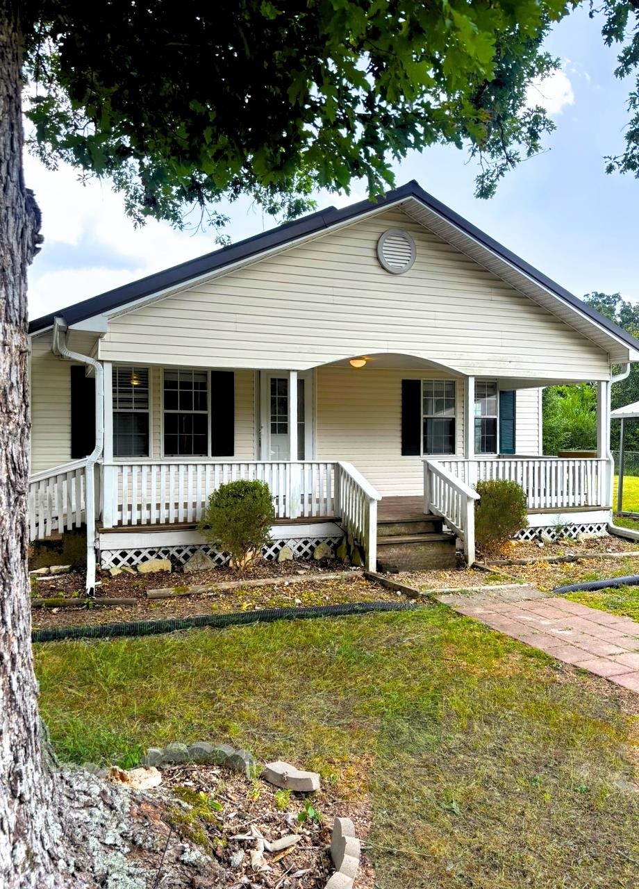 Three Bedroom House on 1 Acre and Move-In Ready - This house is over 1,100 square feet with 3 bedrooms, full bath, living room, kitchen with new appliances, new plank vinyl flooring throughout, new interior paint, vinyl siding, metal roof and a nice front porch to enjoy peacefrul evenings. All of this on 1 acre of flat land.