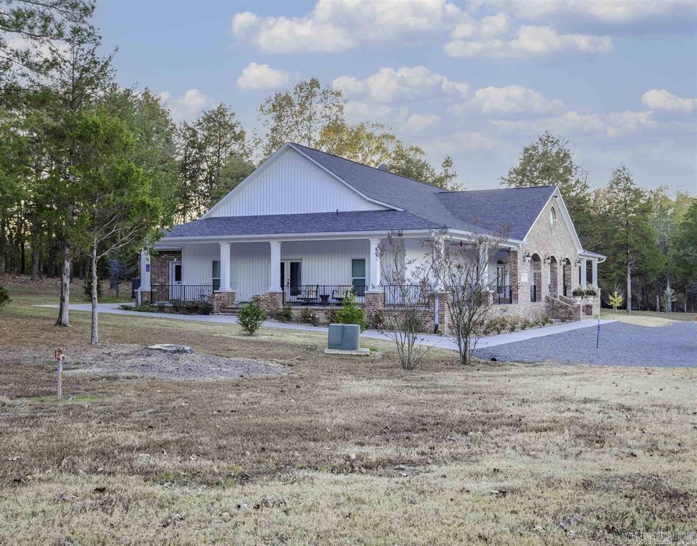 Rare opportunity to own a truly one-of-a-kind property offering endless potential. Situated on 40.58 scenic acres just a couple of miles from I-40 in Conway, Arkansas, this unique estate features a beautiful event center, charming chapel, and a large stocked pond, all set in a peaceful, private setting. Whether you’re looking to host weddings, retreats, corporate events, or expand into a multi-use venue, this property is ready to bring your vision to life. The serene landscape, open space, and natural beauty create the perfect backdrop for memorable gatherings and future development. With convenient access to the interstate while still offering privacy and tranquility, this property combines location, versatility, and opportunity in one rare package. Turnkey business potential or a blank canvas for your next venture—the possibilities here are truly endless.