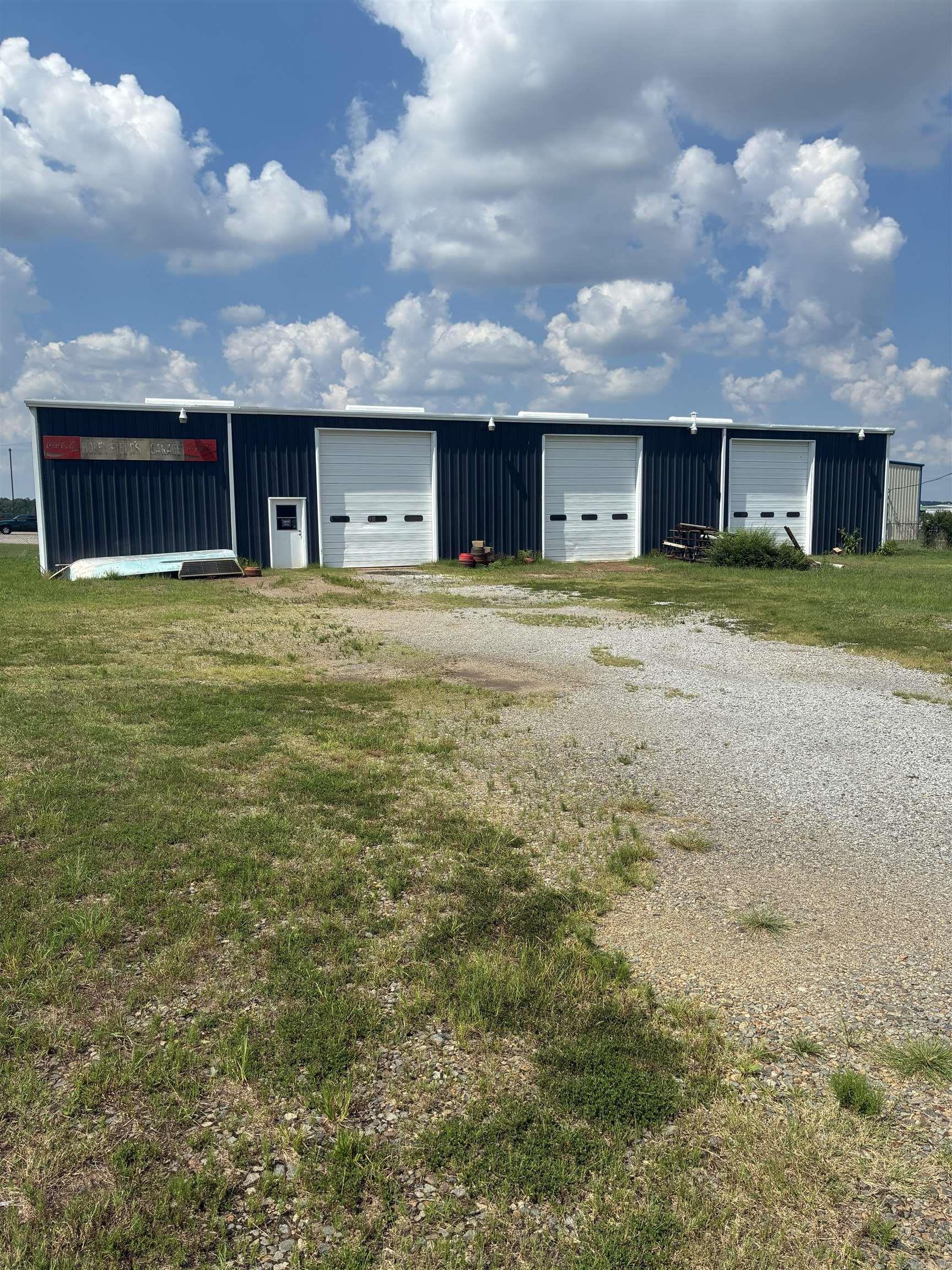 This 5000 sq ft metal building is currently being used as an Auto Garage but could easily be converted so suite just about any business. The building has three overhead doors, office space and two bathrooms. The building is located on 1.4 acres in Searcy city limits making this an amazing investment opportunity!