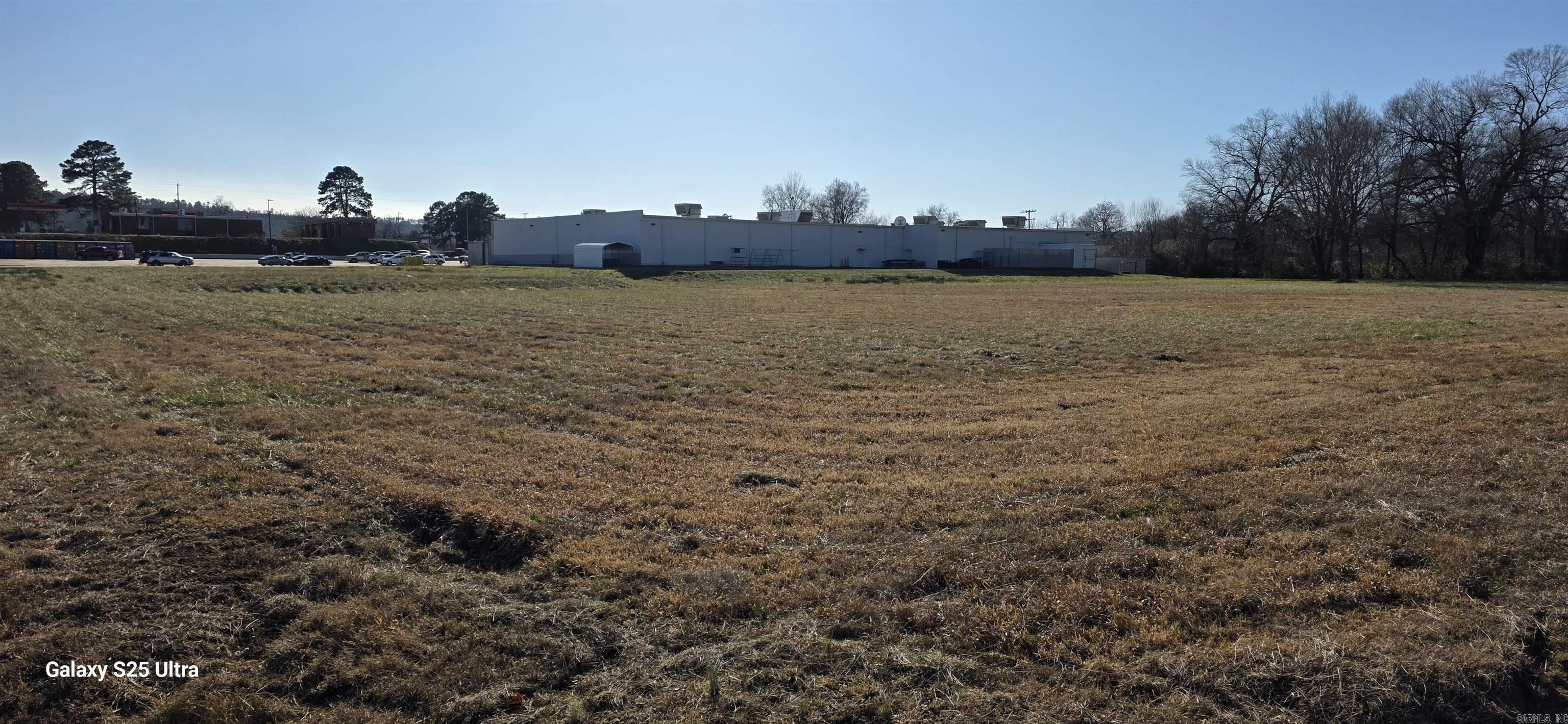 Property next door to the local Walmart, perfect for a new business and build site. Currently lacks sewer access. Current owner purchased from Walmart, use restrictions carry over.