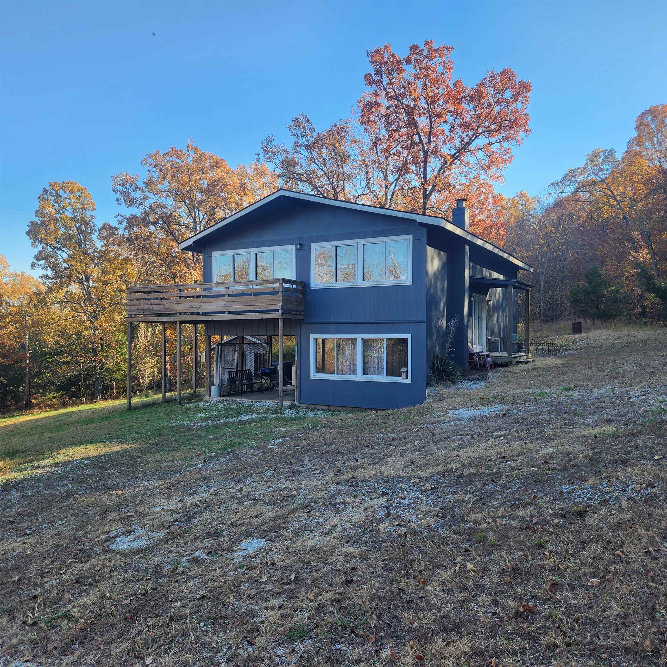 Wonderful, 4 bed, 2 bath home. This home is mostly secluded and tucked away on a little used road in Franklin, Arkansas. It will feel like living in the middle of a forest and yet you can be on Hwy 56 in less than 5 minutes. It is a split-level home with open floor plan kitchen, dining and living room area. 2 Beds and a bath upstairs and 2 beds and a bath downstairs along with the laundry. Nice sized rooms and a 1 car carport. Private deck accessible from the dining room and kitchen. All this nestled on 1+/- acre M/L on the north side of Franklin. Call to book your showing for this beautiful Ozark Foothills Home.