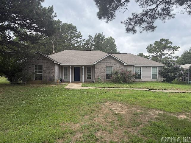 Escape to the peace and privacy of country living on 10 beautiful acres just minutes from Greers Ferry Lake! This well-maintained 3-bedroom, 2-bath home offers 1,888 square feet of comfortable living space with an open-concept layout perfect for everyday living and entertaining. The spacious kitchen features a breakfast area, breakfast bar, and walk-in pantry, while the separate dining room offers flexibility as a home office or additional gathering space.   The split floor plan provides a private primary suite complete with a walk-in shower, soaking tub, dual vanities, and oversized walk-in closet. Step outside to enjoy the covered patio with pergola overlooking the peaceful acreage. The property also includes a barn/storage building, shipping container, two metal carports, and an additional homesite or RV setup with water, electric, and septic already in place. Located just 3 miles from the Greers Ferry Lake boat ramp, this property offers the perfect blend of privacy, functionality, and lake-area convenience.