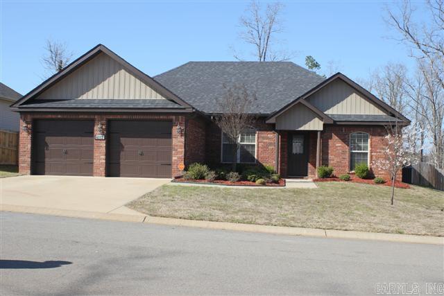 Front door with stained glass and arched doorways are featured in the 3 Bedroom/2 Bath home.  Located in a cul-de-sac, this home also features granite countertops and stainless appliances, level backyard with wood fence and patio for entertaining.