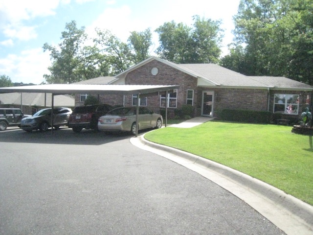 Just like new! This beautiful 2 BR 2BA, walk-in level home is located in a small subdivision at the end of a cul-de-sac near shopping, dining and medical facilities. This home offers an open floor plan, tons of natural light, high ceilings, granite counters, crown molding, stainless appliances, 2x6 construction and extra landscaping! Two covered parking spaces and additional storage are just outside your door.
